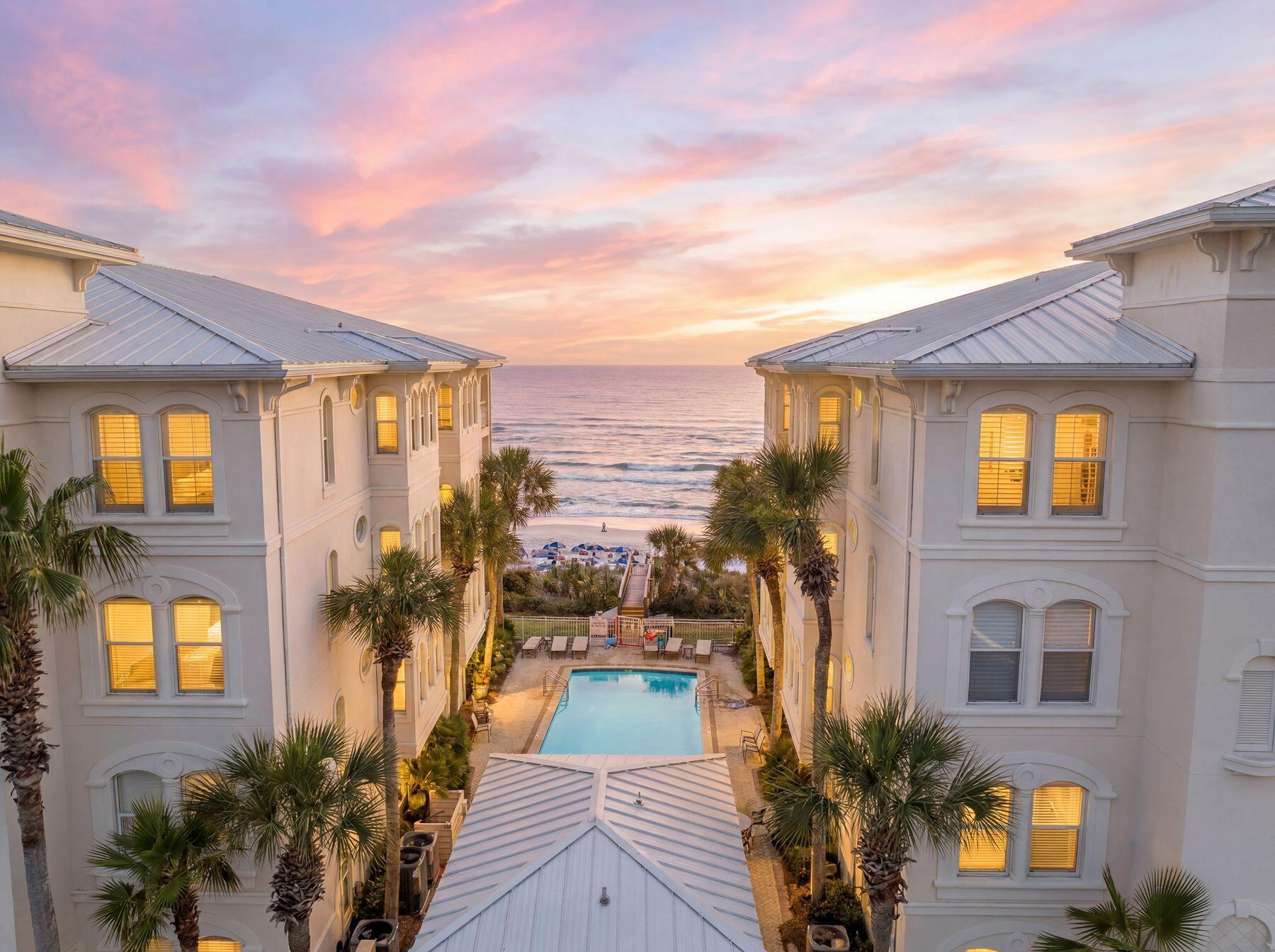 Perched on the second floor of the Eastern building at The Villas at Santa Rosa Beach, this beautifully renovated corner residence offers sweeping, unobstructed Gulf views. Constructed of concrete and accessible by elevator or a single flight of stairs, Unit A201 features 1,814 square feet of single-level living with four bedrooms and three baths.

Inside, Italian porcelain tile and thoughtfully selected finishes create a refined coastal aesthetic. The open-concept living and dining areas flow seamlessly to a spacious Gulf-front balcony, while the kitchen is equipped with upgraded stainless steel appliances, generous counter space, and ample storage for everyday living and entertaining.

The primary suite features a walk-in shower and marble-topped vanity, while two guest suites and a bunk room offer comfortable accommodations for family and guests.

The Villas at Santa Rosa Beach is a gated Gulf-front community comprised of just 24 residences sharing a Gulf-front pool and private beach walkover. Ideally located directly across from Gulf Place, owners enjoy walkable access to shopping, dining, coffee shops, art galleries, and local favorites including Shunk Gulley, The Perfect Pig, and Pizza by the Sea.

Rental-friendly and offered fully updated, Unit A201 presents a rare opportunity to own a turnkey Gulf-front residence in one of the most desirable locations along Scenic Highway 30A. life, a rare gift that only a true gulf front residence can provide.
The location is equally extraordinary, sitting directly across from Gulf Place, the vibrant heart of the western end of 30A, where boutique shopping, art galleries, spas, and celebrated restaurants such as Shunk Gulley, Perfect Pig, and Pizza by the Sea create an atmosphere of effortless coastal enjoyment. Amor Café Coffee offers easy mornings, while evenings come alive with live music and sunsets over the Gulf, all within a leisurely stroll from home.
Set within a gated Gulf-front community, The Villas at Santa Rosa Beach offer privacy, luxury, and unmatched walkability in one of South Walton's most desirable locations. Rental-friendly and beautifully updated, Unit A201 presents a rare opportunity to own a turnkey Gulf-front residence in one of 30A's most coveted addresses.