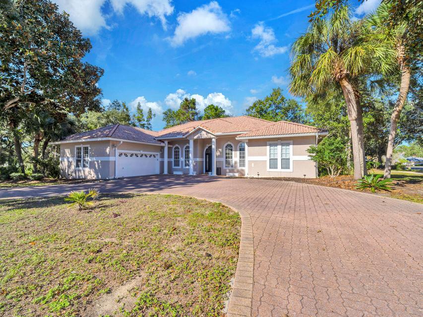 Situated on a desirable one third acre corner lot in Indian Bayou, this home offers a split bedroom floorplan with plenty of room to enjoy the outdoors with a screened porch.  The spacious living area is great for entertaining and everyday living.  Golf enthusiasts will appreciate the community's  setting while conveniently located to the beach, dining, boating and entertainment.  Come experience the coastal lifestyle of Indian Bayou and discover all that this property has to offer.