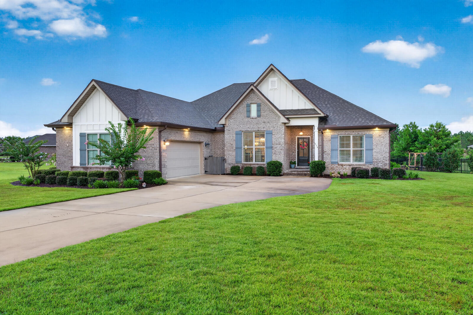OPEN HOUSE SUNDAY AUG 30TH 1-3 PM 
Welcome to easy, resort-style living in this beautifully maintained 4-bed, 3-bath brick home located in the desirable gated golf community of Windswept Estates!
 This home features an open-concept with an inviting foyer, a generous layout with crown molding, engineered hardwoods throughout the entire home, and a cozy custom-built fireplace anchoring the main living area. This floor plan flows seamlessly for entertaining, with a layout that connects the living, dining and kitchen.  
A well appointed kitchen with an abundant of cabinetry, granite countertops, bar seating, spacious island, large pantryand a built in banquet allows for extra seating. Stainless steel applianceand an over the stove pot filler. Primary retreat includes a cozy sitting area,  separate walk-in closets, dual vanities,  tiled shower, and a soaking tub to enjoy at the end of the day!
Step into an outdoor oasis featuring a custom-built screened porch completed with ceramic tile flooring, great for entertaining or just relaxing in the evenings. A landscaped back yard which includes a garden and complete fencing. Several upgrades throughout this home reflect the workmanship and charm.  
 Community perks include relaxing  amenities including  community pools, a clubhouse, tennis / pickleball courts, and a playground.  Neighborhood celebrations throughout the year! Upgrades through the home:
Gutters all sides
Built in fireplace with mantel
Soffit lights on timers
Built in banquette with storage in kitchen
Ceiling fans
Upgraded lighting fixtures
Hardwood floors in all rooms
Additional landscaping including new fence
Paver patio and raised garden boxes with pavers
Reverse osmosis installed under kitchen sink
Coffered ceiling in primary bedroom
Backsplash in kitchen
Work bench in garage
Added shelving in pantry
Cabinets installed in laundry room
Pot filler in kitchen over stove
Garbage disposal
Soft close hardware added on all cabinets
Screened back porch and porcelain floor tile 
Garbage bin area fenced in
Smarthome technology