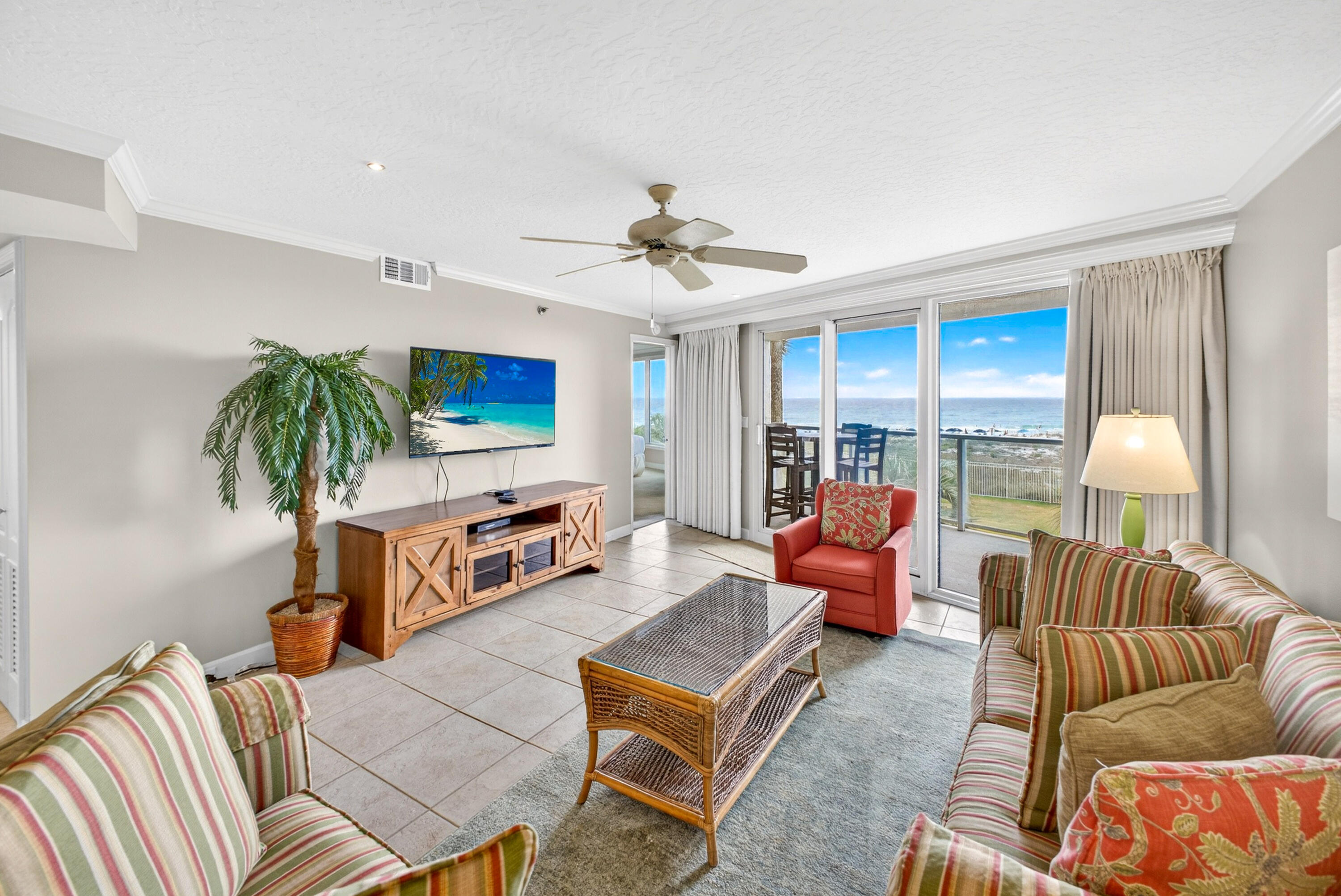 Located in the gated Sandestin Golf & Beach Resort, this 2nd-floor Beachside II condo offers stunning dune and Gulf views from the living room and main bedroom--don't let the 2nd floor fool you. Just steps to the beach with no elevator wait, this turnkey property features high-end Caribbean-inspired furnishings (2023), updated kitchen (2020), tastefully renovated bathrooms with dual sinks and vanity (2025), new paint (2023), carpet (2020), and appliances (2022). Recent building upgrades include a new pool, hot tub, and grill area, plus completed milestone inspection repairs. Strong rental history with repeat guests makes this an ideal vacation home or investment opportunity.