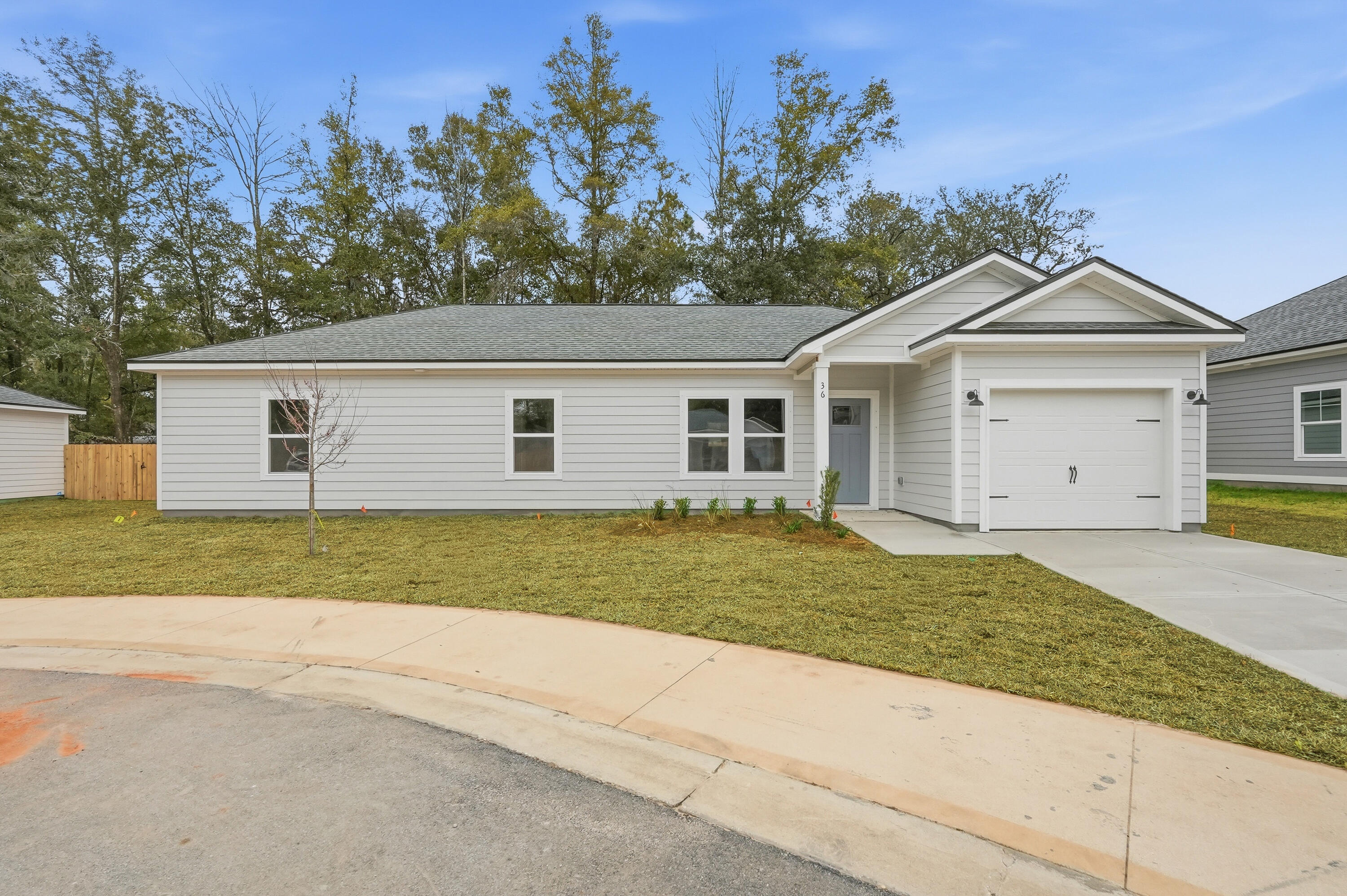 $15,000 TOWARDS BUYER CLOSING COSTS + FREE REFRIGERATOR/WASHER/DRYER/BLINDS - THAT'S A SWEET DEAL FOR THIS cozy cottage - ALL HARDI CONSTRUCTION - Open family/kitchen with dining nook. Raised ceilings, luxury vinyl plank flooring, work island, pantry, white shaker cabinets, quartz countertops.  Large mud room/laundry area.  Owner's suite has walk-in closet. Privacy fenced & landscaped with sprinkler system (HOA provides lawn mowing).