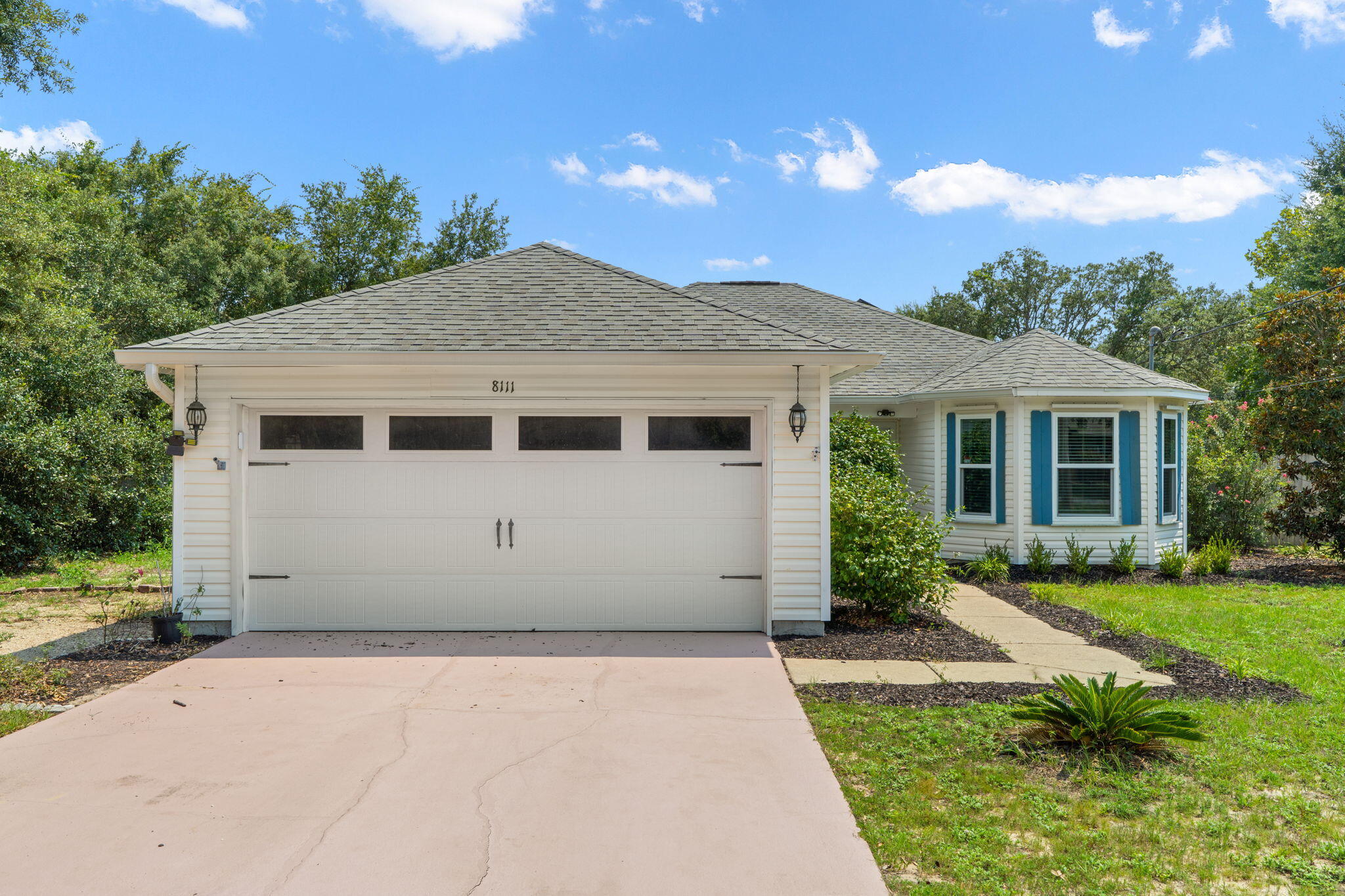 Welcome home to this 3 bedroom, 2 bathroom Central Navarre residence - where coastal comfort, energy efficiency, and the freedom of no HOA all come together! Location is key, and this home places you just minutes from the famous sugary white sands and Emerald waters of Navarre Beach, Navarre's best local dining spots, everyday shopping, and just 11 miles from Hurlburt Field. The standout feature of the home's practical design is a fully paid-off solar panel system, keeping utility costs remarkably low and allowing the current sellers to enjoy an average power bill of under $50 per month! Inside the home, you'll find wood-look flooring throughout the main living spaces. The living room offers a high vaulted ceiling that opens up the space. The kitchen features gorgeous updated solid surface countertops with a seamless integrated tub sink, breakfast bar, and dining area. The 3 spacious bedrooms and spare bath are on the opposite side of the home - the primary with attached ensuite and oversized closet. Step out back to discover an outdoor setup built for hosting and relaxation. A versatile enclosed patio offers a sheltered spot for year-round dining, while an adjacent pergola-covered patio extension expands your shaded living space outdoors. The crown jewel of the back yard is a sparkling above-ground pool wrapped in a custom-built deck, creating a private oasis perfect for sunbathing, gathering with friends, or taking a refreshing dip! Whether you're looking for your next  investment property, searching for a place to downsize to, or you're a first-time homebuyer - this MOVE-IN-READY home is waiting for you!