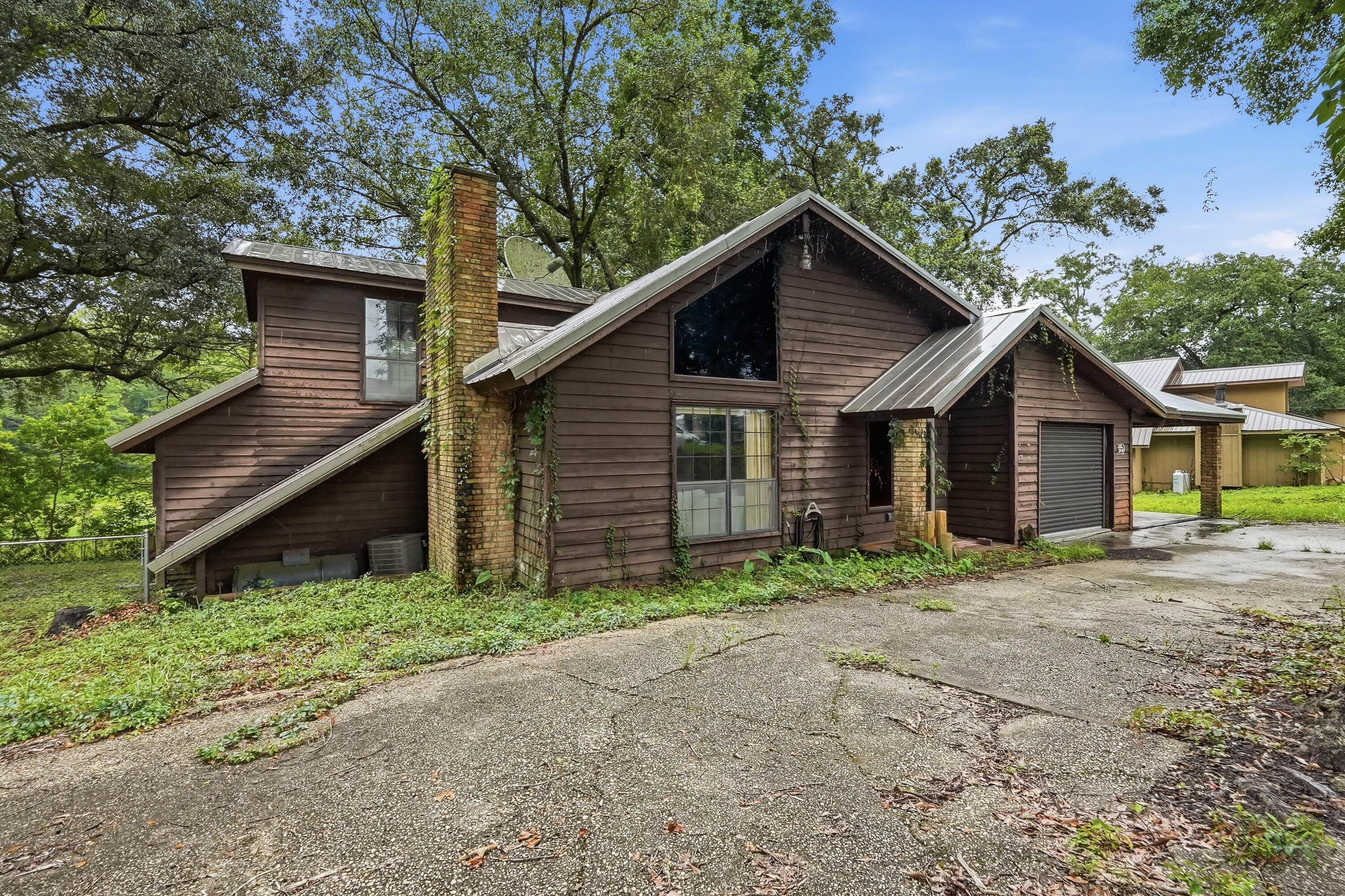 Back on the market by no fault of the seller.  YOUR GAIN!!! Cash Only Opportunity - Bring Your Vision!
Calling all investors, renovators, and buyers looking for their next project! This rustic home is full of character with unique stone and wood accents that offer the opportunity to restore it to its original charm. Nestled in a well-established neighborhood and backing up to a pond, the setting provides a wonderful backdrop for a complete transformation.
This property is in need of significant repairs and updates and is being sold AS IS. Cash buyers only. With the right vision and renovation, this could become a truly one-of-a-kind home. If you're looking for your next investment or fixer-upper project, don't miss this opportunity to unlock its potential.