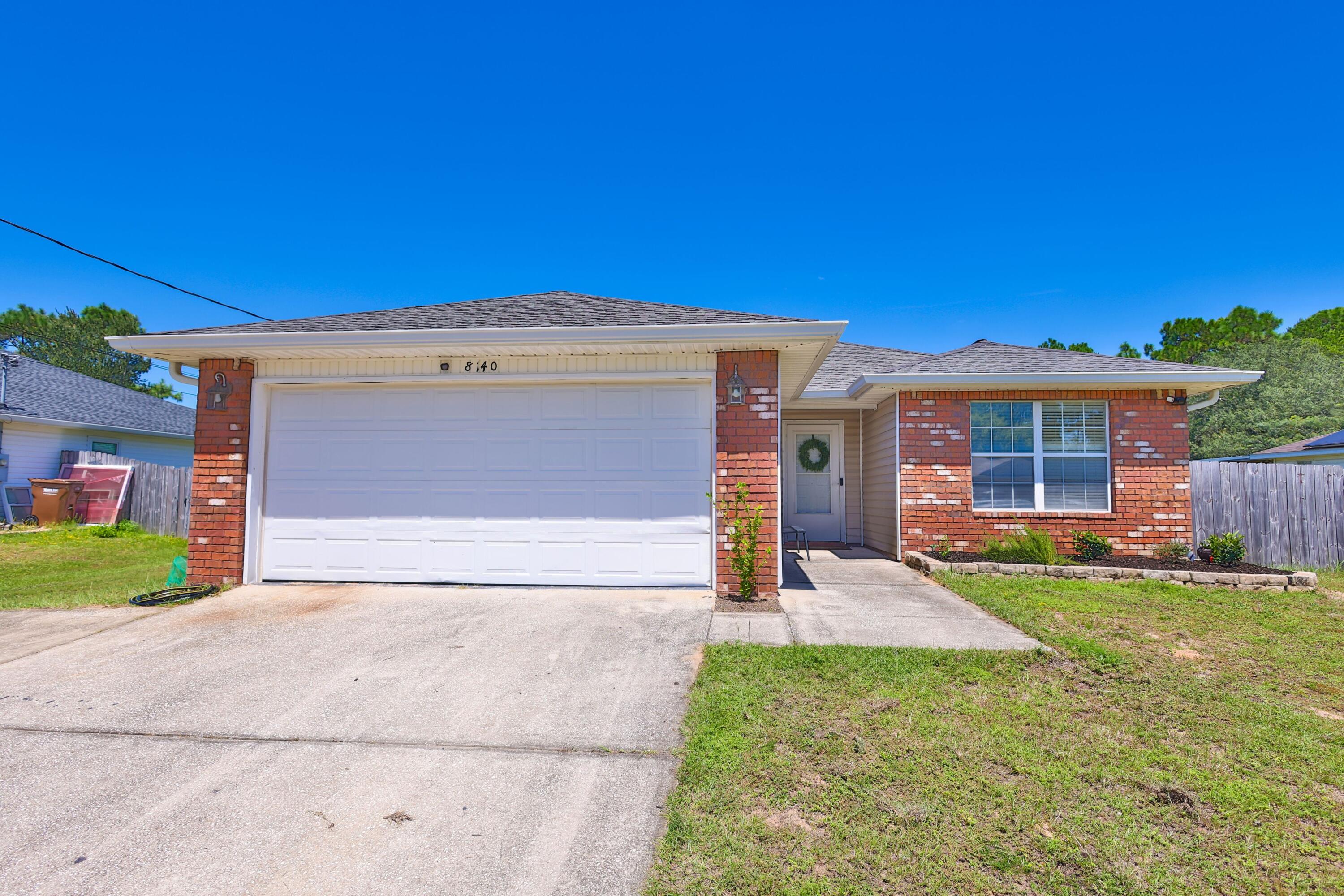 Welcome to 8140 Menorca Street in the highly sought-after community of Navarre, Florida! This beautiful 4-bedroom, 2-bath home offers the perfect blend of comfort, style, and affordability.

Built in 2005, this home features some beautiful upgrades, including a stunning primary bathroom.

The floor plan creates an inviting space for entertaining guests or enjoying everyday life. The spacious primary suite provides a relaxing retreat, while the additional bedrooms offer flexibility for family, guests, or a home office.

Step outside to the large back yard and covered patio to enjoy Florida's beautiful weather. This outdoor space is sure to become a favorite.

Located just minutes from Navarre's white-sand beaches, shopping, dining, military bases, and top-rated schools, this home offers convenience and an exceptional lifestyle.

Opportunities like this don't come along often, especially with an assumable VA loan at an incredible 3.25% interest rate for qualified buyers.

Schedule your private showing today and experience everything this beautiful home has to offer!