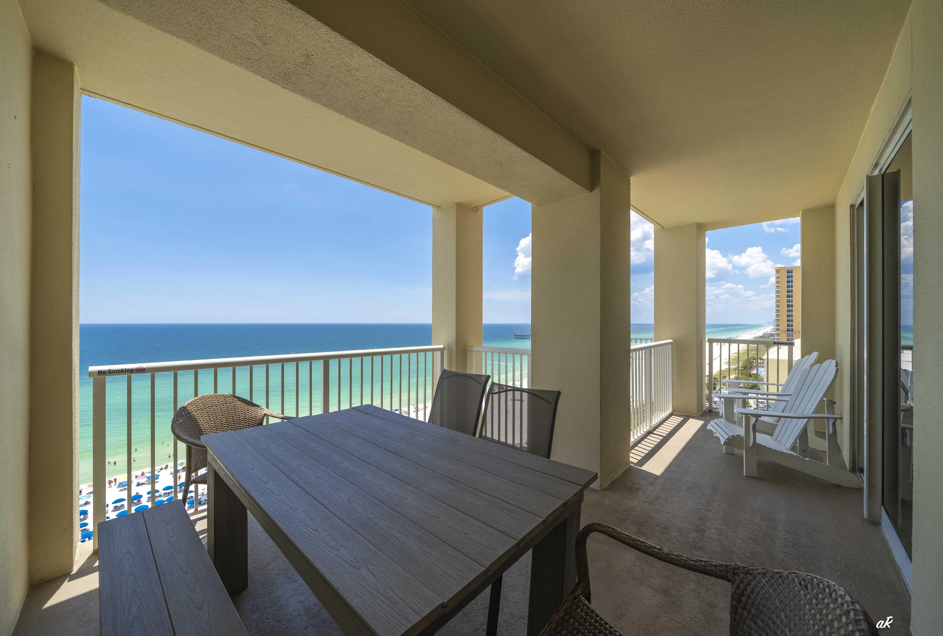 PRICE IMPROVEMENT 
Experience the ultimate in coastal living with this gulf-front condominium at Grand Panama Beach Resort, situated in the heart of Panama City Beach, Florida. This three-bedroom, two-bath residence offers panoramic views from every room and features an expansive balcony overlooking tranquil green waters--perfect for enjoying both sunrise and sunset. The open-plan kitchen is equipped with stainless steel appliances and granite countertops, seamlessly connecting to the living area for optimal entertaining.
The spacious primary suite boasts direct access to the Gulf-front balcony, an ensuite bathroom with dual vanities, a walk-in shower, and a soaking tub. The second bedroom also enjoys Gulf views and connects to a renovated guest bathroom featuring a large walk-in show