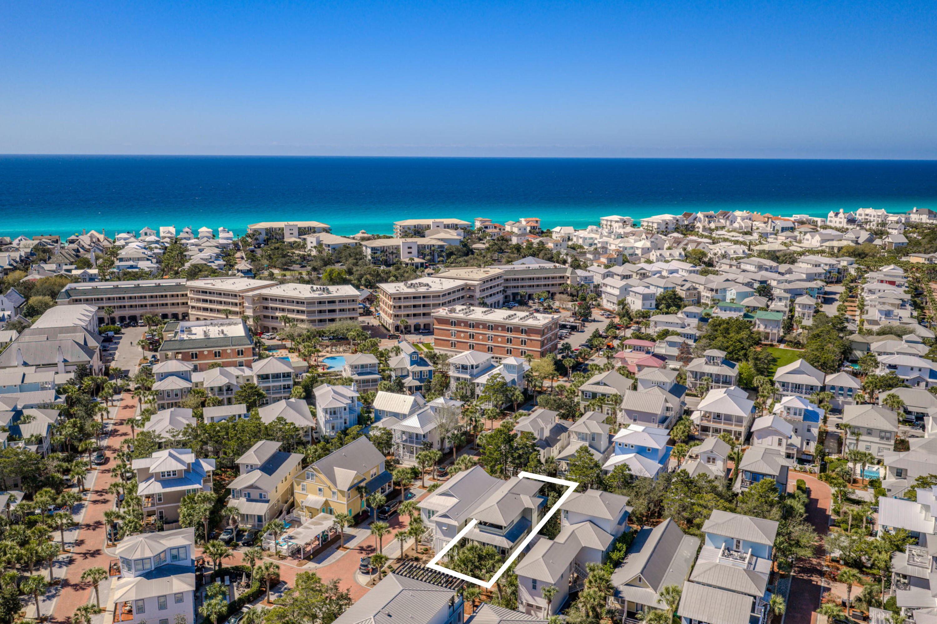 Three-Story Coastal Retreat With Trailside Porches And Strong Rental Appeal


Set along a wooded nature trail just moments from the famed lagoon-style pool, this thoughtfully composed three-story beach home offers the kind of 30A ownership opportunity that feels equally suited to personal escapes and strong investment performance. Known as 'Reset Button,' the residence has been carefully maintained and self-managed by its owners, with annual rental income exceeding $127,000 for each of the past four years. The result is a home with proven appeal, generous gathering spaces, and a distinctly personal point of view.

Inside, approximately 2,500 square feet unfold with natural pine wood flooring, abundant windows, and an open floor plan designed for easy connection. The kitchen is both functional and inviting, appointed with stainless steel appliances, pendant lighting, and a large island with counter seating. Just beyond, the dining and living areas create an easy rhythm for entertaining, family meals, and relaxed evenings after the beach. The interiors strike a rare balance: polished yet comfortable, stylish yet unfussy, with original artwork by Alyson Wickey that adds character and a sense of place.

The five-bedroom, four-bath layout offers exceptional flexibility for larger groups. A first-floor guest suite opens to a private porch and sits near the main living areas for convenience. On the second level, the primary suite enjoys its own balcony and a spacious bath with soaking tub and marble countertops. Two bunk rooms on this floor add versatility for family use, while a full hall bath and dedicated laundry area enhance everyday livability. The entire third floor functions as an expansive suite with a wet bar, full bath, office area, and access to two oversized porches that extend the living experience even further.

Outdoor spaces are a defining feature here, with six porches and balconies offering quiet corners for coffee, conversation, afternoon reading, or evening cocktails beneath the coastal sky. The rear yard, positioned along the walking trail, adds another layer of privacy and charm, with room to grill, dine, and gather around the fire pit.

Located in Seacrest Beach along Scenic Highway 30A, the home enjoys access to one of the area's most sought-after amenities: the 12,000-square-foot resort-style lagoon pool, along with convenient tram service to the beach. Positioned on the Rosemary Beach side of Seacrest, it is also close to shopping, dining, and the white-sand shoreline that makes this stretch of the coast so beloved. With its strong income history, distinctive personality, and highly livable layout, this property offers far more than a place to stay; it is a home people return to again and again.