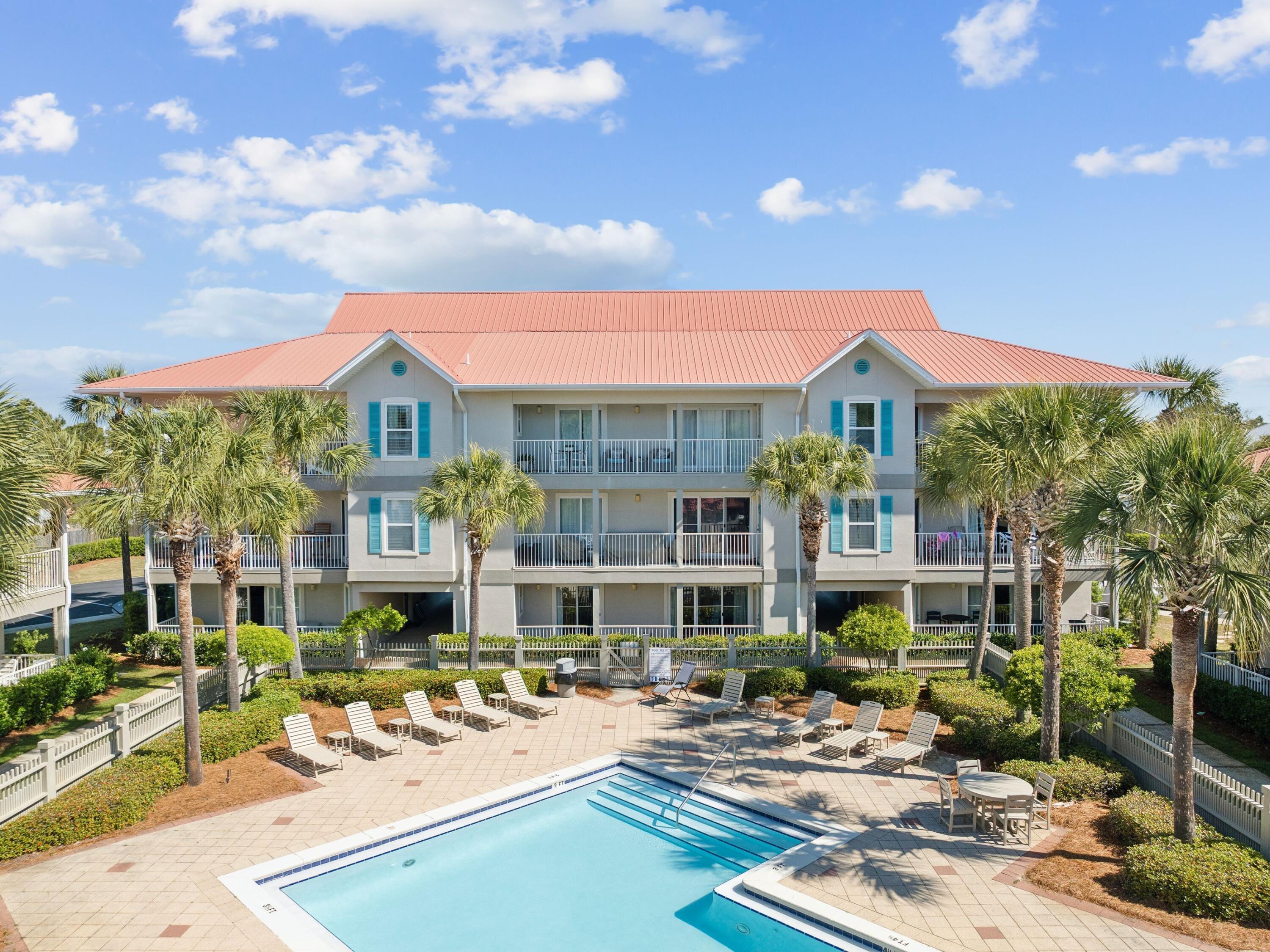 This updated first floor, three bedroom, three bath condo at Rollin Tide Villas sits just steps from the beach, providing an ideal location along 30A in the desired area of Seagrove Beach. Each bedroom has its own private full bath with tile flooring and walk-in shower. The kitchen has been remodeled with open cabinetry, butcher block countertops, and a large range with vent hood. Hardwood flooring runs throughout the main living areas. The expansive porch area looks out towards the pool, and two walk-in closets provide plenty of storage space. Come enjoy all this great location has to offer.