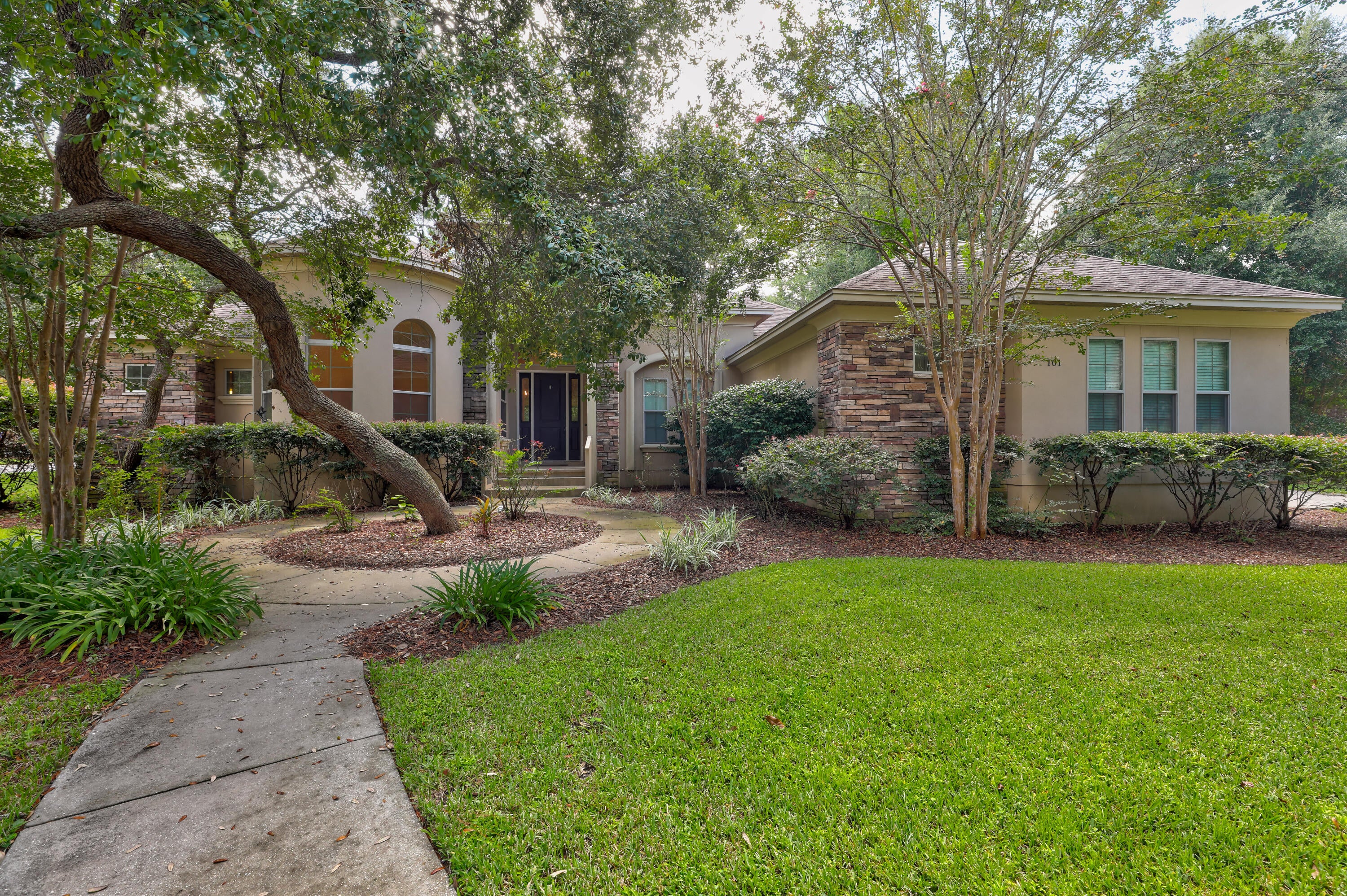 Set on an almost half-acre corner lot in Swift Creek, 101 Blossom Creek Run offers single-level living near the neighborhood's pool, lake park, trails, courts, and gathering spaces. This Arthur Rutenberg home pairs its established setting with thoughtful architectural detail and practical everyday features.

Stone accents and impact-rated windows frame the exterior, while inside, a split-bedroom layout places the primary suite on one side of the home and three additional bedrooms on the other. The great room is defined by a barrel coffered ceiling and fireplace, with a distinctive circular wall adding character to the den. A concealed walk-in pantry, mudroom, central vacuum, and tankless water heater bring useful function to the home's design. Swift Creek amenities include a community center, pool with outdoor kitchen and natural-gas grill, two tennis courts, basketball court, playground, and a lake park with fishing dock and gazebo. Nature trails, footbridges, and boardwalks create another reason to step outside.

A home with room to breathe, details to notice, and a neighborhood built for getting outside.
Come see how this corner of Swift Creek fits your next chapter.

All information is deemed reliable and provided for informational purposes; buyers are encouraged to independently verify all details.