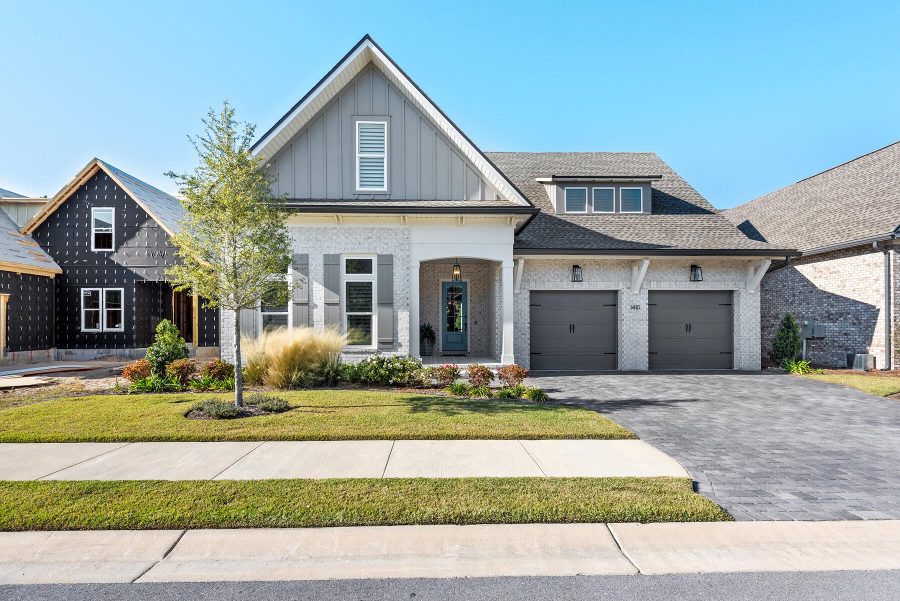 Nestled in the heart of highly sought-after Bluewater Bay, this stunning better-than-new home at 1410 Addie Drive is the perfect blend of luxury, comfort, and thoughtful design. Built by renowned Randy Wise Homes and less than two years old, this exceptional property is packed with upscale upgrades and designer touches throughout! Featuring 4 spacious bedrooms, 3.5 bathrooms, a dedicated office, and two generous living spaces, this home offers the ideal layout for both everyday living and entertaining in style. 

From the gorgeous gourmet kitchen with a walk-in working pantry to the custom built-ins flanking the fireplace, every inch of this home has been carefully curated. Plantation shutters, a water softener system, customized closets, elegant hallway library wall, and high-end finishes elevate the home FAR beyond new construction basic standards.

Step outside to your private backyard retreat where an extended covered patio, summer kitchen, expansive paver entertaining area, cozy fire pit, and relaxing spa hot tub create the ultimate outdoor oasis. Located in the center of Bluewater Bay close to top-rated schools, golf, dining, marina access, and the beautiful Emerald Coast beaches, this extraordinary home truly checks every box! Make an appointment to see it today and lock in the best 'like new' construction on the market!