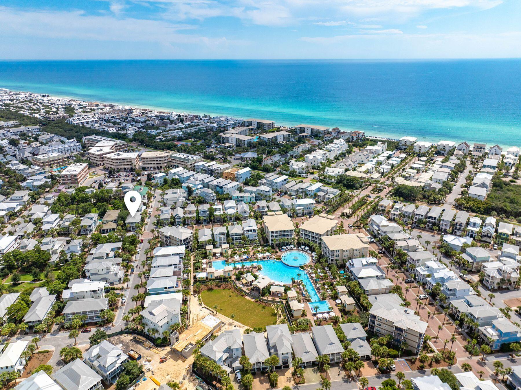 Seller is motivated! Bring your offer for this ideally located 4-bedroom home in Seacrest Beach. Welcome to Shore Thing, a 4-bedroom, 3-bath home offering 2,408 square feet in one of 30A's most sought-after communities. Just one block from the iconic 12,000-square-foot lagoon pool and a short five-minute walk to the shops and dining at Seacrest Beach Village, this property is perfectly positioned for both personal enjoyment and investment potential. 

The open-concept main level features a bright and inviting living area with hardwood floors, a dining space for eight, and a well-equipped kitchen with a center island for casual meals and entertaining. Also on the first floor are a king bedroom, full bath, and a convenient laundry room. Upstairs, the primary suite offers a spa-inspired bath with dual vanities, a soaking tub, and a separate shower, along with balcony access complete with a porch swing. Two additional guest rooms, a queen bedroom and a bunk room with twin-over-twin bunks, share a full hallway bath. 

Multiple porches provide inviting outdoor living spaces with rocking chairs and cozy seating areas, ideal for enjoying the coastal breeze. Community amenities include deeded beach access with seasonal tram service and the spectacular lagoon-style pool surrounded by palm trees, waterfalls, and ample lounging space. Offered fully furnished, this home presents an excellent opportunity to personalize and enhance value, with projected rental income of $110,000-$115,000 annually. Ideally situated with convenient access to Rosemary Beach, Alys Beach, and the Timpoochee Trail, this property is a strong contender for a second home or vacation rental along 30A. Buyer to verify all information and dimensions.
