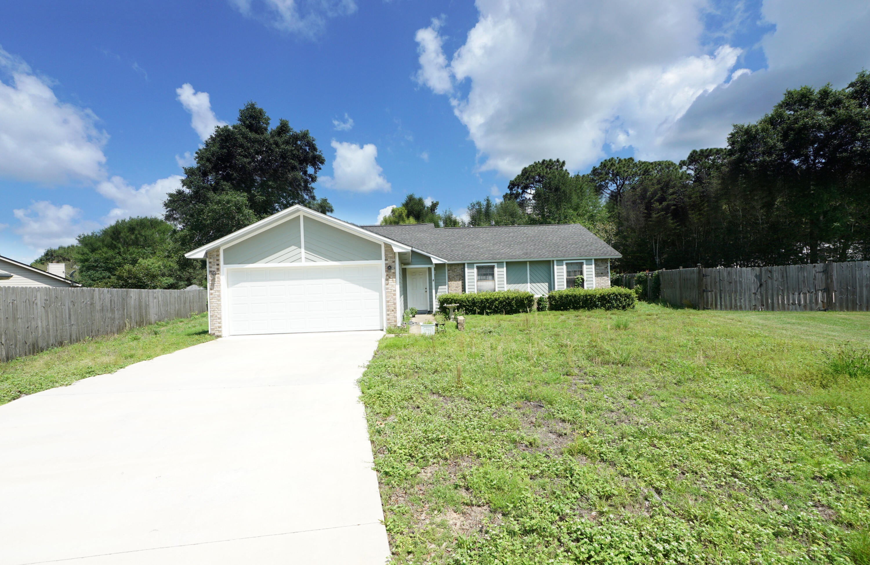 *** OPEN HOUSE SUNDAY AUG 23RD 1 - 3PM*** LOCATION LOCATION!  Beautiful Bluewater Bay neighborhood at the foot of the Mid-Bay Bridge. 5 minutes to DESTIN! Enjoy the quaintness of Niceville with easy access to the Beaches, Restaurants and Activities of Destin. This well maintained home provides a neutral canvas for your decorating ideas.  Three Bedroom and 2 Full Baths on a large pie-shaped lot allows room for a pool, pergola and/ or fire pit. Inside you'll find a spacious Living Room with Fireplace. Kitchen is well laid out with a bright  Eat-In Dining Area. Double Vanities in Master Bath. 2 Car Garage. Brand New Concrete Driveway. New Hardy type siding on home. Roof 2016.  Plan to see it today! Buyer to verify all pertinent info.
