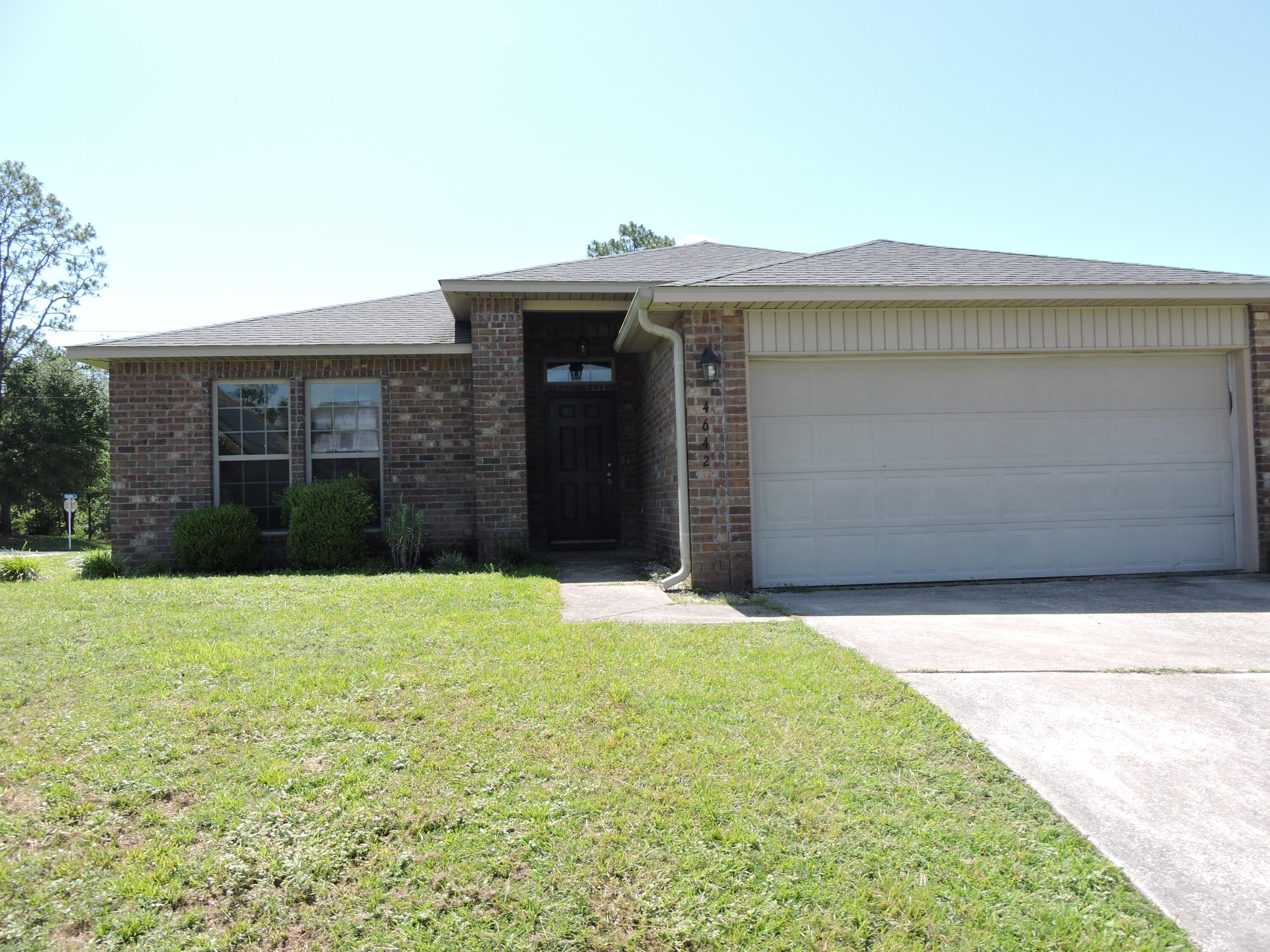 SOUTH OF I-10 & CLOSE TO ALL BASES!! Available Now! Freshly Painted throughout in Agreeable Gray!  This 3br/2bath/2 car garage home is 1615 SF all brick home on a corner lot!! Open floor plan, with kitchen overlooking the family room as well as dining & sun room! Kitchen features breakfast bar, granite countertops, composite sink, plenty of counter space & cabinets, gooseneck faucet, pantry and stainless steel appliances. Laundry just off the kitchen. Ceramic tile in foyer, kitchen, laundry & baths. Large master bedroom, and master bath with separate shower, garden tub, double vanity and oversized walk-in closet. Enter the sunroom from the master bedroom or the dining area to go the privacy-fenced back yard.