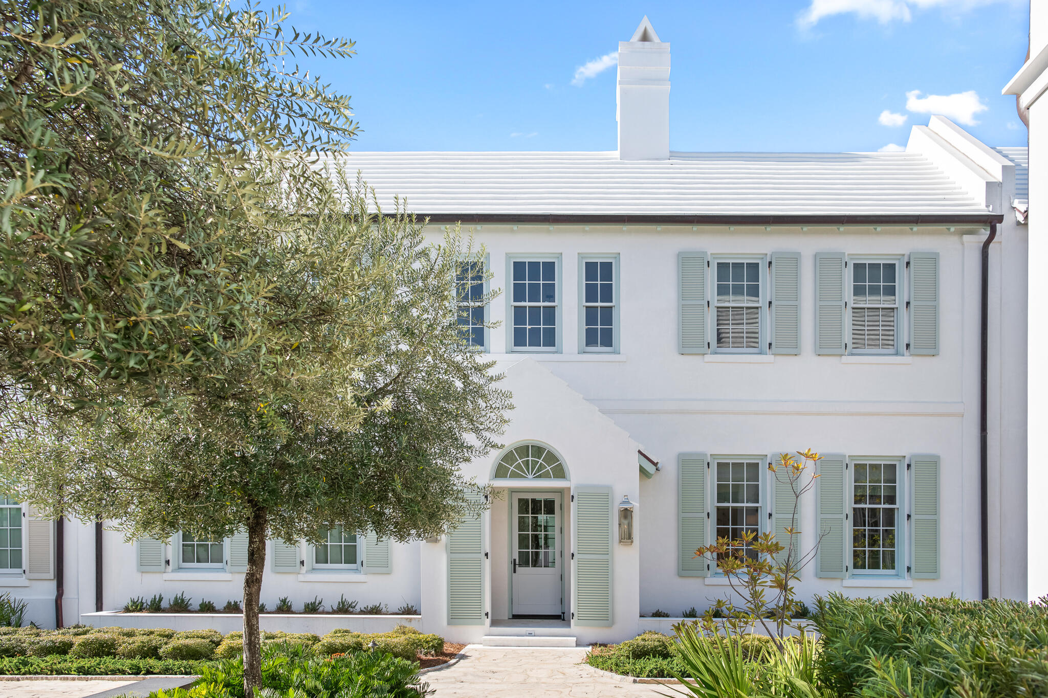 Welcome to 16 Smugglers Alley, Alys Beach, nestled on the picturesque Turtle Bale Park North. This exquisite residence epitomizes coastal luxury living, spanning 3,446 square feet with 4 bedrooms and 4.5 baths, making it the perfect sanctuary for family and friends.  Turtle Bale park is the lead pedestrian connector in Alys Beach taking you to the Gulf of Mexico or one of the many world class amenities.

As you enter, you'll be greeted by a beautifully designed courtyard that invites you to enjoy the sunshine, complemented by an outdoor living area featuring a Summer Kitchen, ideal for entertaining or casual family meals. The first floor includes two single-car garages, providing ample space for vehicles and beach accessories. The heart of the home is a chef's dream kitchen outfitted with Thermador appliances, seamlessly connected to the dining and living areas. The home's elegant fireplace in the living room, creates warmth and charm, while a luxurious primary bedroom on the first floor ensures ease and accessibility, complete with a beautifully appointed en suite bath.

Ascend to the second floor where the main primary bedroom awaits, featuring two spacious closets and a breathtaking bathroom that opens to a large covered porchperfect for morning coffee or evening sunsets. Two generously sized guest bedrooms each feature en suite bathrooms, providing privacy and comfort. An additional outdoor living space with a wet bar caters to guests, making it an ideal gathering spot.

The home showcases exquisite Venetian plaster walls, while the first floor is adorned with rice white Fire Rock stone pavers that transition beautifully to white oak wood flooring as you ascend the stairs. This property effortlessly blends elegance with modern comforts, making it a dream home in the highly sought-after town of Alys Beach. 

16 Smugglers Alley is within proximity to the newly completed Silva Pool & Restaurant amenity opening in March.  Passage to and from are connected by Alys Beach's renowned walkable pedestrian paths.  This Fortified for Safer Living built home honors sustainability with its white concrete masonry construction, combining style with environmental consciousness. Offered fully furnished, this property provides a turnkey opportunity for those seeking a sophisticated coastal lifestyle in Alys Beach, renowned for its beautiful surroundings and world-class amenities. Discover your personal oasis at 16 Smugglers Alleywhere luxury meets coastal charm. Schedule a private tour today and experience the allure of Alys Beach living!
