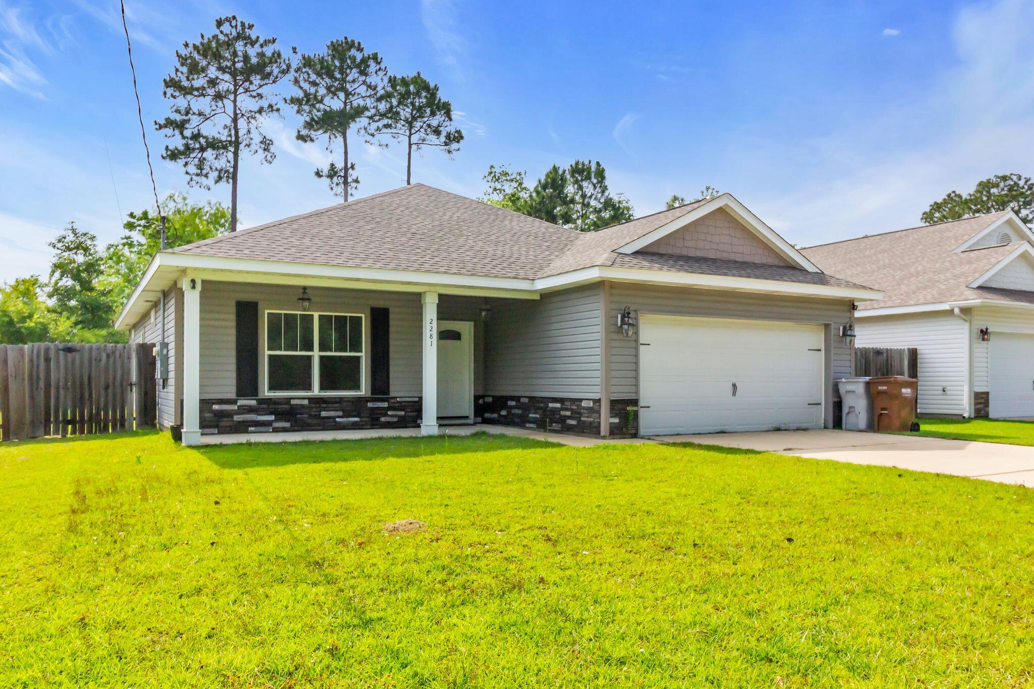 Introducing a charming 3-bedroom, 2-bathroom house located in the desirable Navarre, FL area. This lovely home features a fenced yard, perfect for outdoor activities and privacy. Just minutes away from the beach, residents can enjoy the sun, sand, and surf whenever they please. The open floor plan creates a spacious and inviting atmosphere, ideal for entertaining guests or simply relaxing at home. Step outside onto the covered patio and soak in the beautiful Florida weather. Don't miss out on this wonderful opportunity to make this house your new home. Conveniently located and move-in ready, this home is a perfect place to call home. Don't miss your chance to see it! Schedule a showing today. Call 850-729-0399 View rental requirements or apply at www.RentwithBSR.com

No smoking or vaping. Pets may be allowed with some restrictions and a $400 non-refundable pet fee. FEES: $50 per adult 18+ application fee, Landlord Liability Policy (if proof of Renter's coverage is not provided) $15 mo, Pest Assurance pest control policy $20 mo.