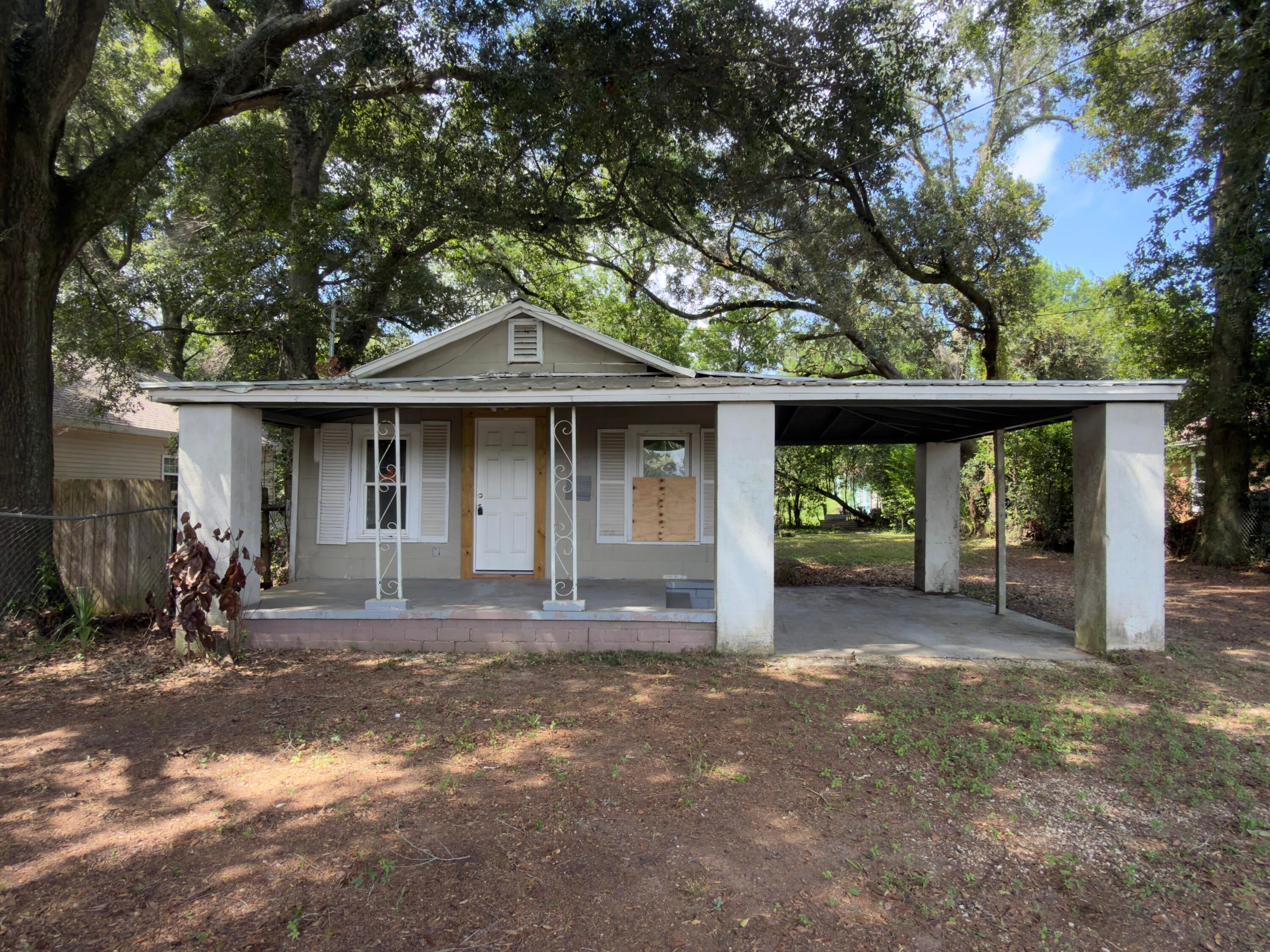 Located in central Pensacola just minutes from major interstates, downtown, and shopping centers, this 1930s  REO property is packed with potential for the right buyer. The existing layout features 862 square feet of living space, comprising two bedrooms and a single bathroom. Thanks to its accessible crawlspace foundation, relocating plumbing, updating structural layouts, or expanding the floorplan is straightforward and flexible. Whether you are searching for a profitable long-term rental, a promising fix-and-flip project, or an affordable starter home to customize, this property offers a fantastic canvas for your vision.