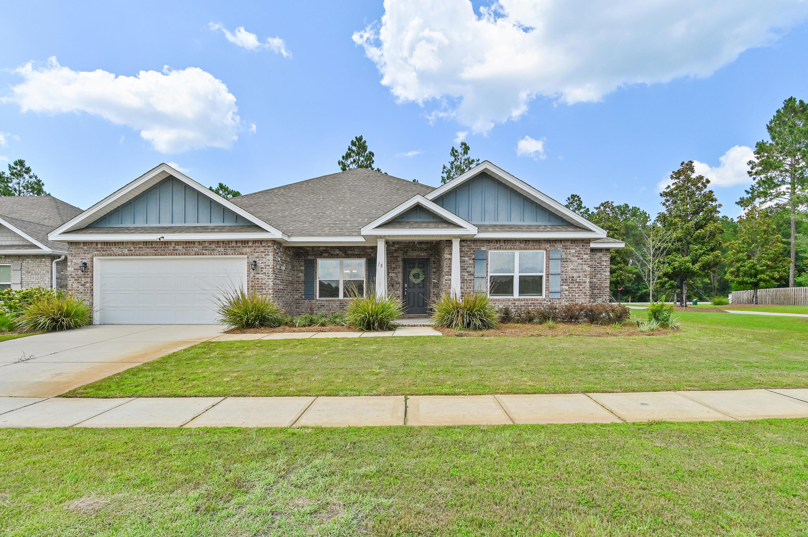 *** Seller is offering $5000 in Closing Cost credit*** Welcome to 18 W Sky Way in the highly sought-after Hammock Bay community in Freeport, FL. Built in 2023, this beautifully designed brick home features the popular Rosemary floor plan with 4 bed, 3 full baths a dedicated flex room ideal for a home office, gym, or playroom, and nearly 2900 square feet of thoughtfully designed living space. The open-concept layout is filled with natural light and offers luxury EVP flooring, crown molding, a split-bedroom design, and a spacious owner's suite with a sitting area, tray ceiling, oversized walk-in closet, and private bath. The chef-inspired kitchen features quartz countertops, a large center island, walk-in pantry, and gas range, creating the perfect space for everyday living and entertaining. The home is located in desirable Flood Zone X.

Life in Hammock Bay offers an exceptional resort-style lifestyle with three pools, a fitness center, clubhouse, pickleball and tennis courts, sports courts, playgrounds, dog parks, miles of walking and biking trails, a neighborhood general store, food truck court, and year-round community events. Conveniently located in Freeport, you're just minutes from Choctawhatchee Bay, Blue Mountain Beach, Scenic Highway 30A, the Gulf of America, state parks, boating, fishing, shopping, dining, and some of Florida's most beautiful white-sand beaches.