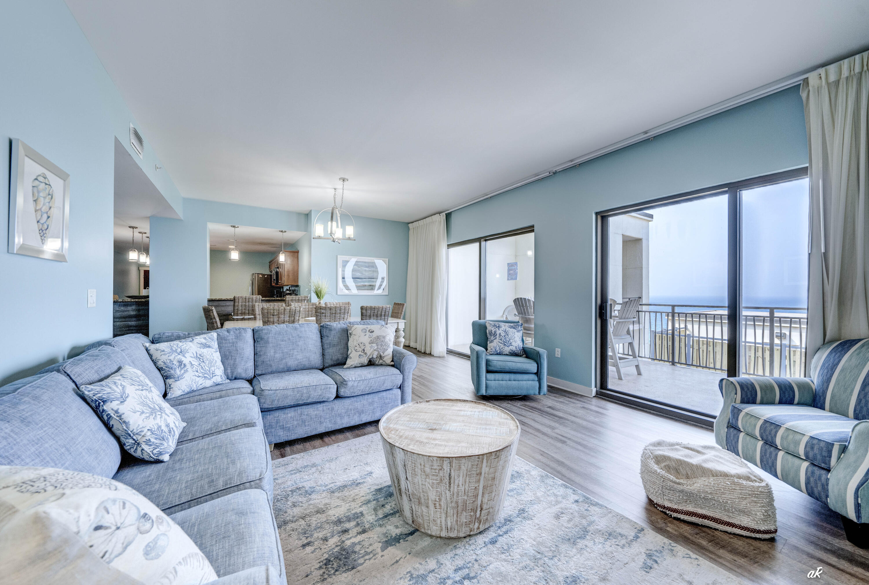 Step into coastal living at its finest with this spacious 3-bedroom, 2.5-bath condo perfectly positioned right across the street from the sugar-white sands of Panama City Beach. Offering a stunning, unobstructed Gulf view, this 1,963 sq ft residence blends comfort, convenience, and pure beachside charm. Inside, you'll find a generous layout ideal for full-time living or a high-demand vacation rental. Three well-sized bedrooms, two full baths, and a convenient half bath create plenty of room for family and guests. Large windows bring in natural light and frame the beautiful emerald waters just steps away. Location is everything -- and this one is unbeatable. Sharky's Beachfront Restaurant sits directly across the street, making sunset dinners effortless. You're also right in the heart of Panama City Beach's top attractions, entertainment, shopping, and nightlife, giving you instant access to the best the area has to offer. Whether you're looking for a personal retreat or a strong investment property, this condo delivers the Gulf-coast lifestyle with style, space, and a view that never gets old.