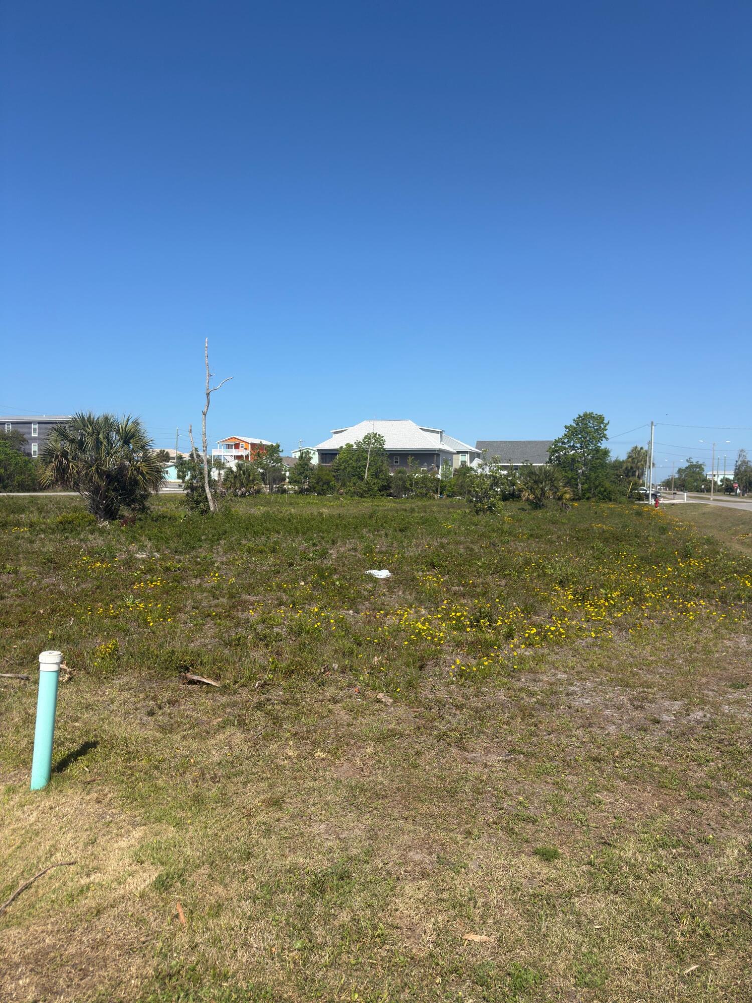 Oversized 75' x 150 corner lot with easy access to the dedicated and public beaches of Mexico Beach. Bring your building plans and vision as there is plenty of room for a pool and accessory space on this large homesite. This X FLOOD ZONE lot is only about 550' from the beach, where one can enjoy a short evening walk or golf cart ride and witness some of the most glorious westerly facing sunsets anywhere. Easy back access to your neighbors, parks, commercial spots, and other locations via the Florida Ave Boulevard. Competitively priced as the smaller corner lot across the street just sold for less per square for than this parcel is priced. New survey on file. Some information obtained via the Bay County Property Appraiser's website, please verify if important.