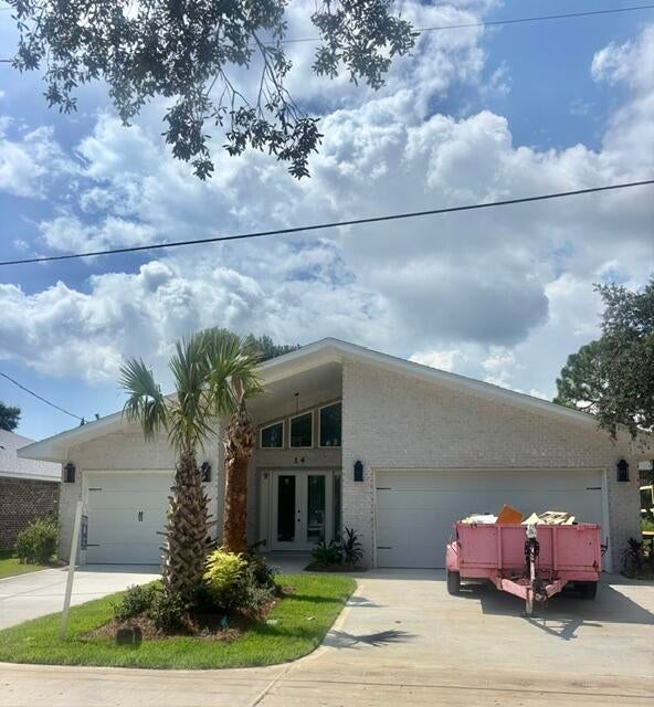 Seller offering to pay $20,000 in closing costs. buy down and or prepaids. 

This beautiful 4-bedroom, 3 car garage, 3 1/2 bath brick home combines timeless design with modern touches. Kitchen, dining and living room boast 12 ft. ceilings. 

Gas range and continuous hot water heater. 
 
The kitchen is equipped with an oversized fridge and freezer, complemented by a wet bar and separate drink fridge perfect for entertaining.

Guest bathrooms feature oversized 42-inch tubs, while the primary suite offers a floor-to-ceiling tiled shower, a 6-foot soaking tub, private water closet, and separate his and her closets.

A three-car garage provides secure parking and storage. This home is a perfect mix of comfort, luxury, and functionality.

Completion is expected in October 2026. Completion expected in October 2026.