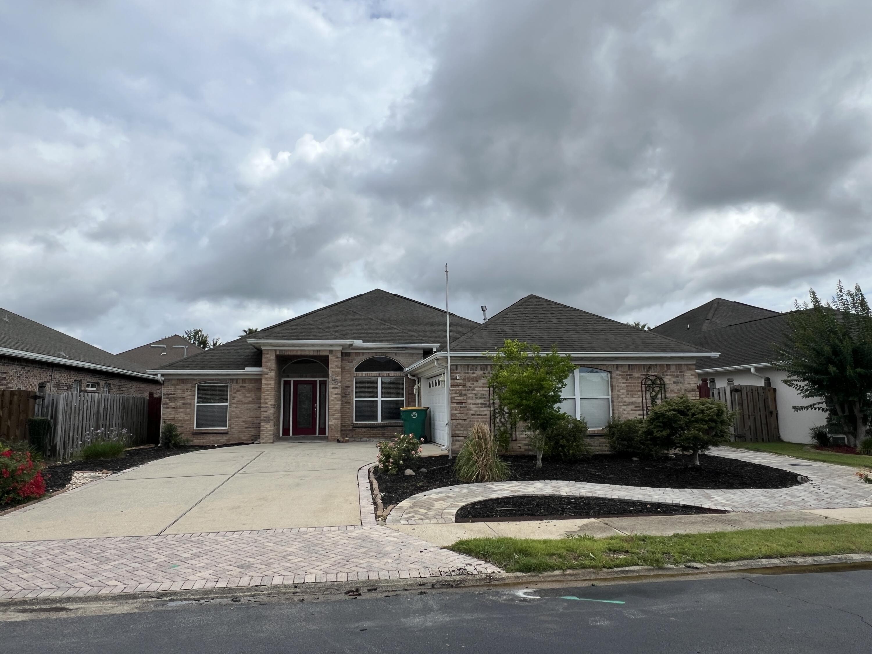 Available Now and move in ready....Easy commute to bases, beaches and shopping.  Located in the heart of Fort Walton Beach.  Gated community features this 4/2 floor plan in a gated community with community pool.  Over 2100 sqft. of living space, covered back porch, 2 car garage, large laundry room and more.  Spacious living areas, formal dining area, eat in kitchen, office/4th bedroom space.  Guest rooms are large and split floor plan.  Many built-ins are featured in this home for displaying trinkets, books and collectibles.  Fenced back yard.  No inside smoking or vaping.  Pets okay with owner approval and non-refundable pet fee.  New HVAC.  Newer carpet.  A must see for location and amenities.