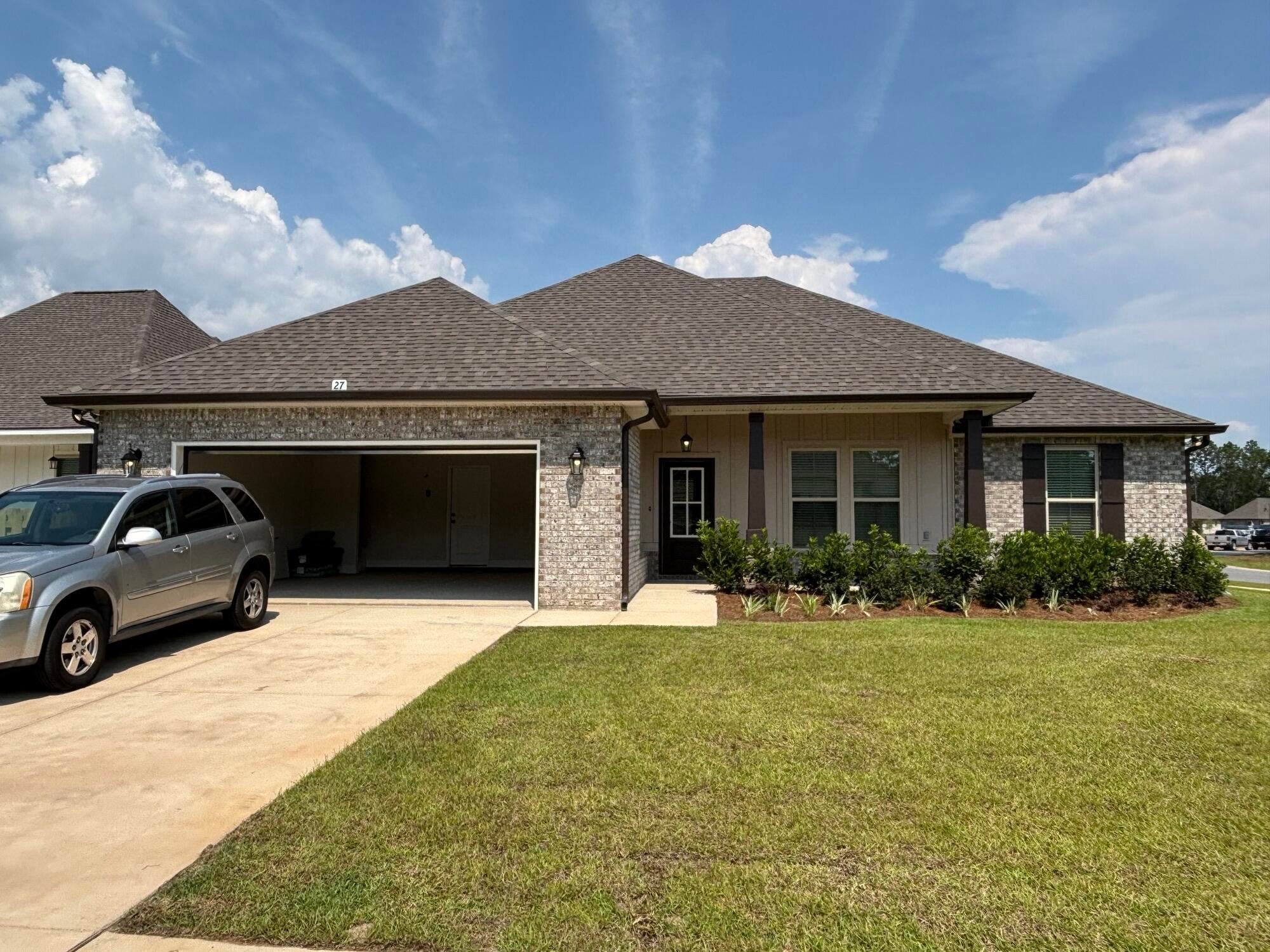 Located on a corner lot, the IONIA III G in Bird Song at Hammock Bay community offers a 4BR/2BA, open design. Upgrades added (list attached). Features: double vanity, garden tub, separate custom tiled shower, and walk-in closet in master bath, double vanity in 2nd bath, kitchen island, walk-in pantry, boot bench and drop zone in mudroom, covered porches, undermount sinks, custom kitchen backsplash, crown molding, LED lighting, smart connect WIFI thermostat, framed mirrors in all bathrooms, landscaping package, architectural 30-year shingles, flood lights, and more! Energy Efficient Features: water heater, electric kitchen appliance package, vinyl low E windows, and more! Energy Star Partner.