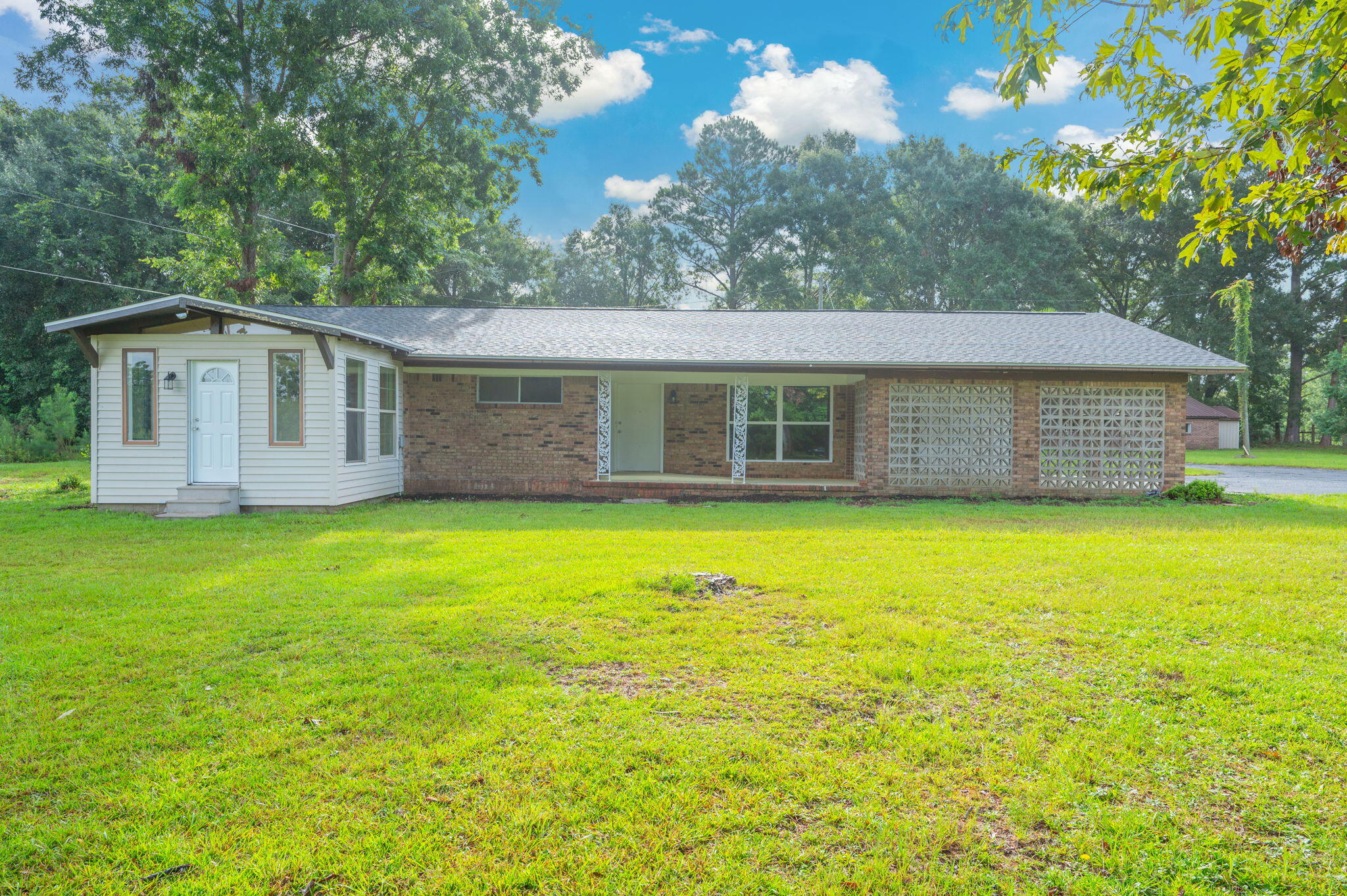 Income potential, acreage, and a pool--all in one property. Situated on 1.44 acres just 2 miles from Crestview High School, this unique property features a 4-bedroom, 3-bath main home with a dedicated office, plus a detached 2-bedroom, 1-bath guest house.

The separate guest house is perfect for generating rental income, accommodating multigenerational living, hosting guests, or serving as a private home office or studio. (Buyers should verify any short-term rental use with local regulations.)

Step outside to enjoy your own private retreat with a sparkling in-ground pool, plenty of room for entertaining, and open outdoor space to park an RV or boat, garden, or simply enjoy the privacy that comes with over an acre of land.

Adding to the property's charm are mature peach trees that produce an abundance of fresh peaches each season, creating the perfect backyard orchard and a true taste of country living.

Properties that combine income potential, a detached guest house, acreage, a pool, and mature fruit trees are rare. Don't miss this opportunity to own one of Crestview's most versatile properties.