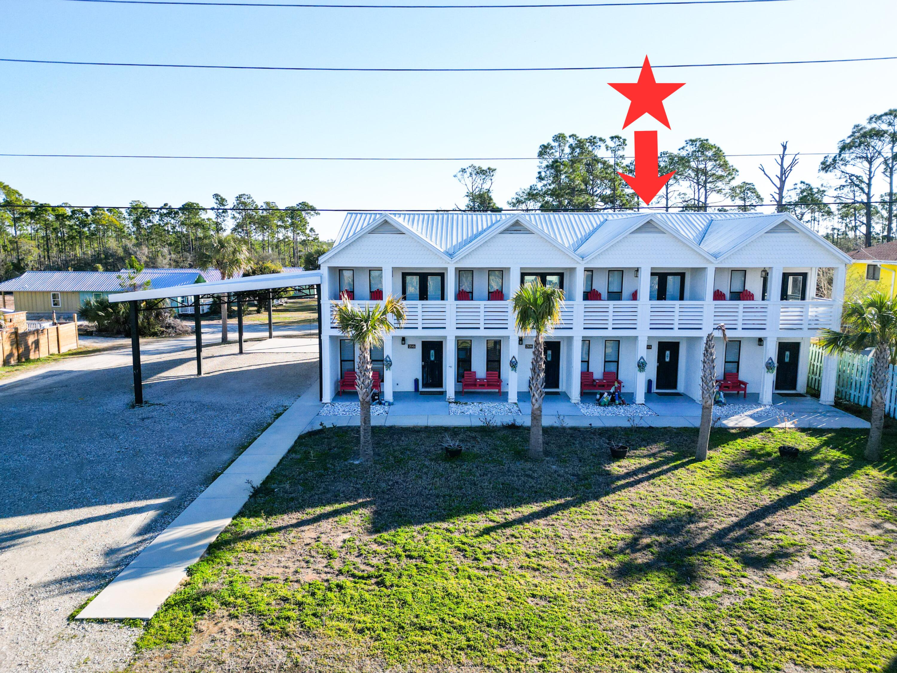 Turn key unit is part of a quadplex across the street from the Gulf of America. Each unit is a 2 bedroom 1 full and 1/2 bath with an open floor plan and gulf views. These completely furnished units have a covered front porch, second story covered deck off of a top bedroom with Gulf of America views. Need to entertain or just want extra space? There is a spacious back patio that is partitioned for privacy and large back yard.  There is a recorded beach access pedestrian easement for easy beach access right across the street. Conveniently located equidistant between Port St Joe and Mexico Beach for a variety entertainment options. The subdivision is decades old and has its own ingress and egress road with no thru traffic. NO HOA!! All units are in an X flood zone per the Gulf PA website, Verify if important. Some dimensions taken from the Gulf County Property Appraiser's website, please verify if important.
