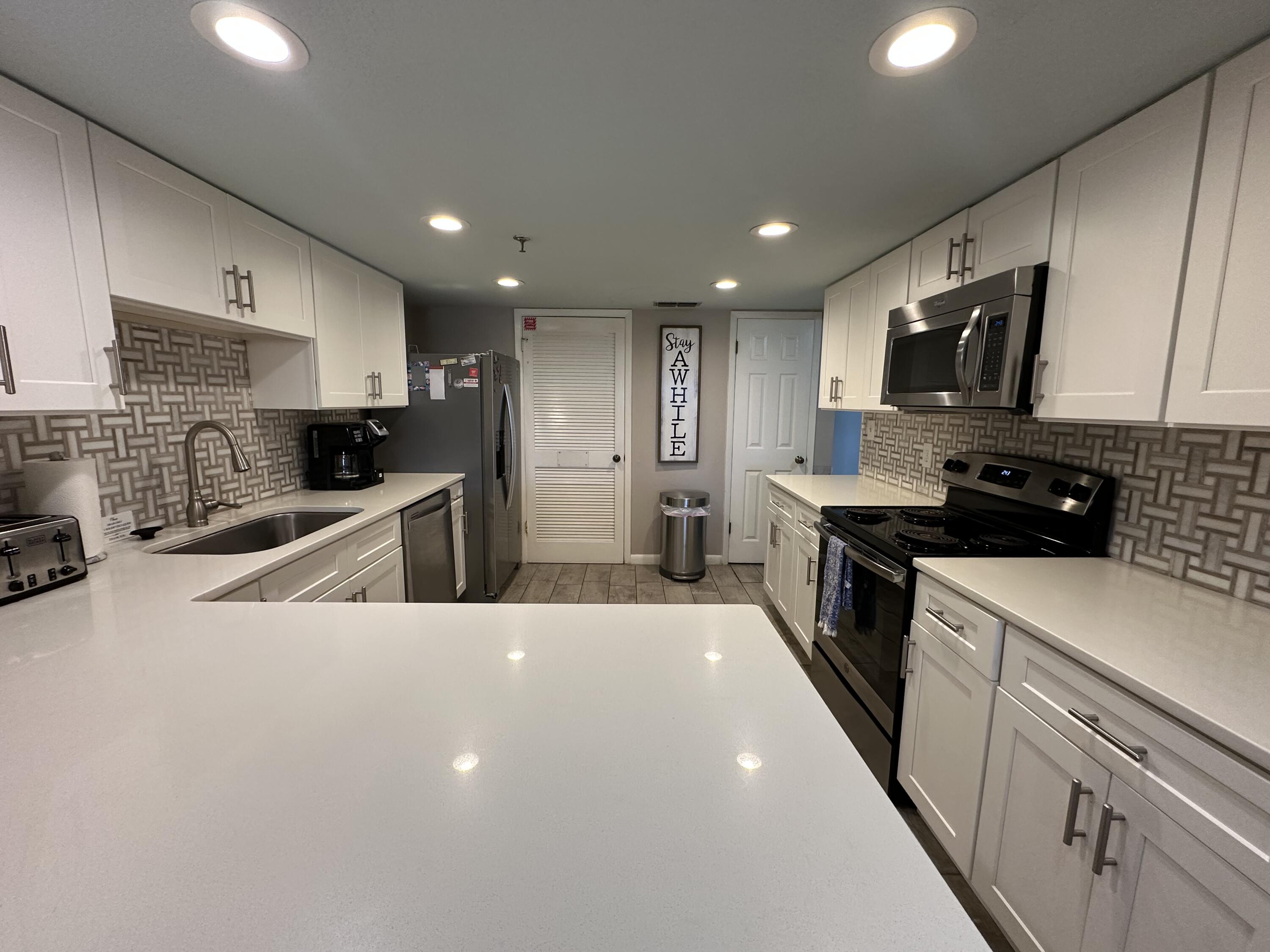 BREAKERS EAST CONDO - Residential