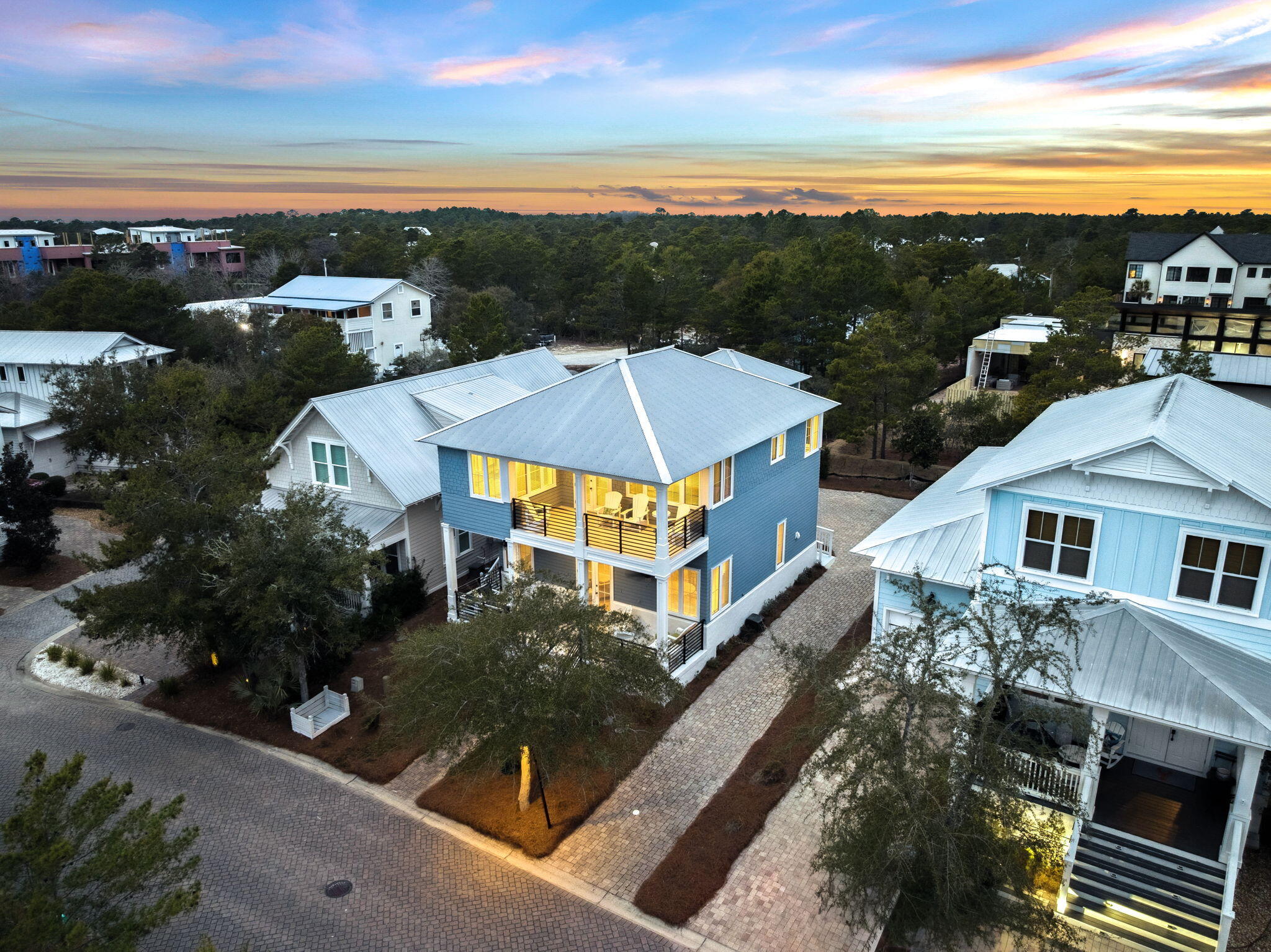 Step into a masterpiece of architectural design, where every detail exudes sophistication and luxury. This stunning residence boasts superior craftsmanship, featuring exquisite millwork, soaring 12-foot ceilings, and solid hardwood floors that create an ambiance of timeless elegance. The chef's kitchen is a dream come true, outfitted with a gas stove, custom cabinetry, and distinctive lighting that perfectly blends style and function.  This home comes fully furnished and turnkey ready for full time residence, short term rentals, and/or the perfect second home.

As an added bonus, a charming carriage house--added in 2014--offers an additional bedroom, bathroom, and kitchenette, making it an ideal space for guests, a home office, or a private retreat.  Tons of parking space for up to 6 cars.   This property is located in Highland Parks offer resort style pool which is heated in cool months as well as tons of additional amenities.   Highland Parks is rated one of the best rental locations on 30A.   This one is priced to sell and won't last long!