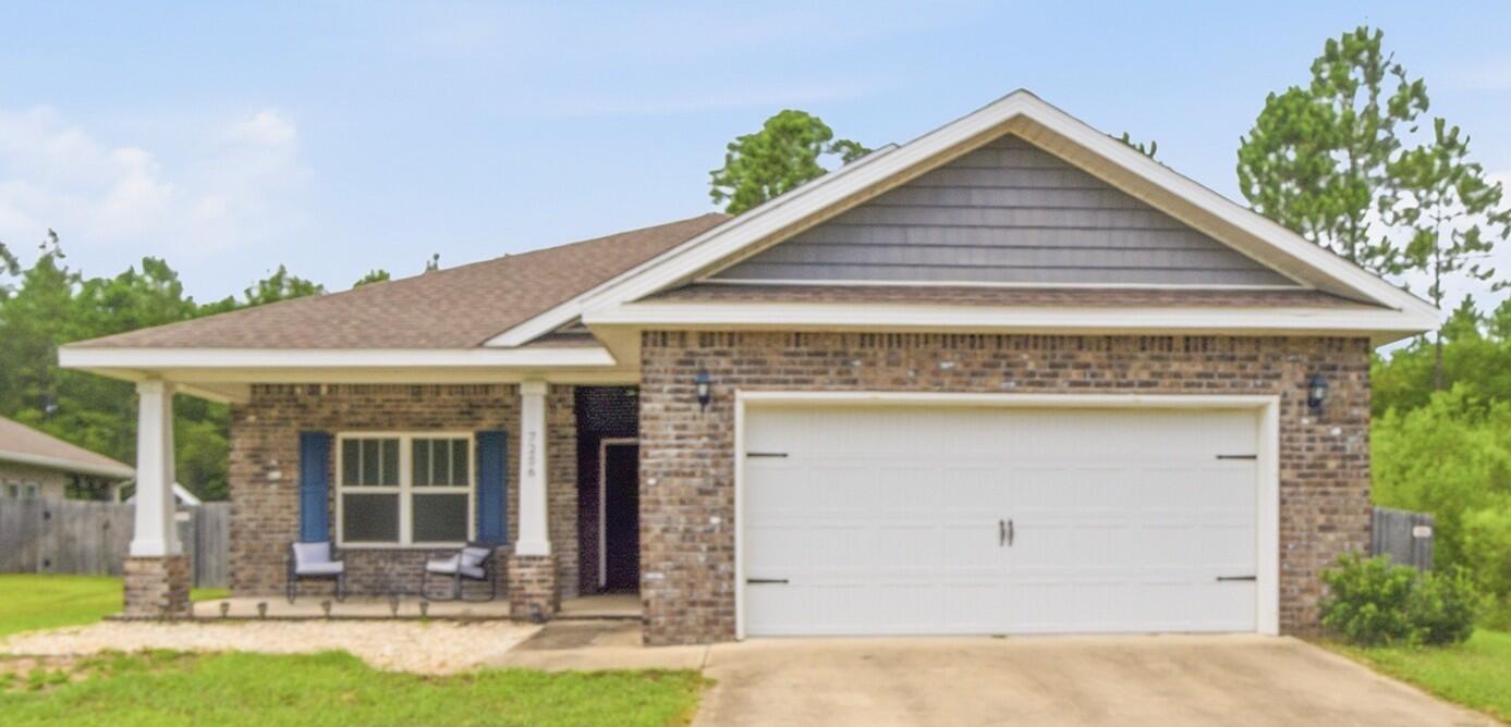 Built in 2020, this well maintained and quality built Herbst Home feels practically new and offers the desirable Carlos floor plan on a generous 0.36 acre lot. The four sided all brick exterior provides curb appeal and durability, while the private lot backs up to wooded space. Inside, the open concept layout connects the living, dining, and kitchen areas. The split bedroom floor plan offers a spacious master suite with private access to the covered back porch. The master bath features a tiled walk in shower with dual shower heads and a frameless glass door, plus a separate garden soaking tub. The kitchen is finished with solid wood soft close cabinetry and stainless steel appliances. Granite runs throughout the home. Upgraded tray ceilings throughout include a double tray in the living room and tray ceilings in the kitchen and master bedroom, accented by crown molding and custom tray ceiling lighting. Outside, enjoy the covered and screened back porch with ceiling fan and TV mount for thos cool fall football games.  Fully sodded yard with an irrigation system. Privacy fenced yard already in place for your fur baby, kids, or just convenience. A VA assumable loan with a low 2.5% interest rate is also available, offering a great opportunity for another VA buyer! Don't miss the opportunity to make this private, better than new home yours - schedule your showing today!