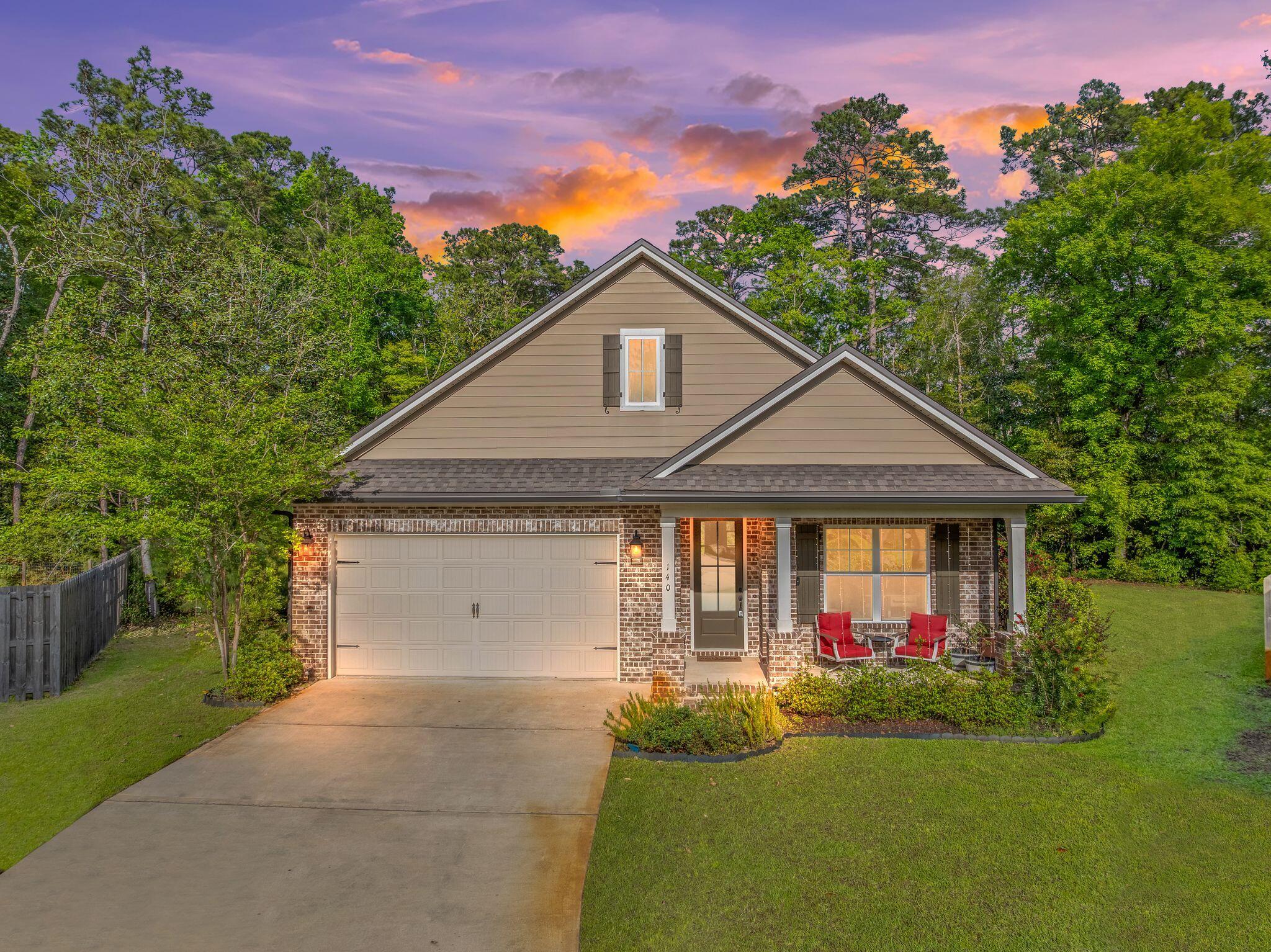 Rare opportunity to own one of the largest lots in Marina Village in this upgraded Cobia floor plan tucked away on a quiet cul-de-sac just minutes from Freeport Marina. This move-in ready 3BR + flex room, 2.5-bath brick home offers over 2,000 sq.ft. of light-filled living with 9' ceilings, crown molding, recessed lighting, and custom finishes throughout. The spacious owner's suite features a soaking tub, tiled shower, double vanity, and custom walk-in closet. Designed for everyday living and entertaining, the gourmet kitchen includes granite countertops, under-cabinet lighting, pull-out shelving, oversized island seating, and a walk-in pantry. Step outside to a private backyard oasis with plenty of room for a future pool on nearly a half-acre lot. Marina Village offers a community pool, dog park, stocked fishing ponds, sidewalks, and walking access to the marina and bayou lifestyle. Home warranty included. Coastal living, space, and upgrades all at an exceptional value.