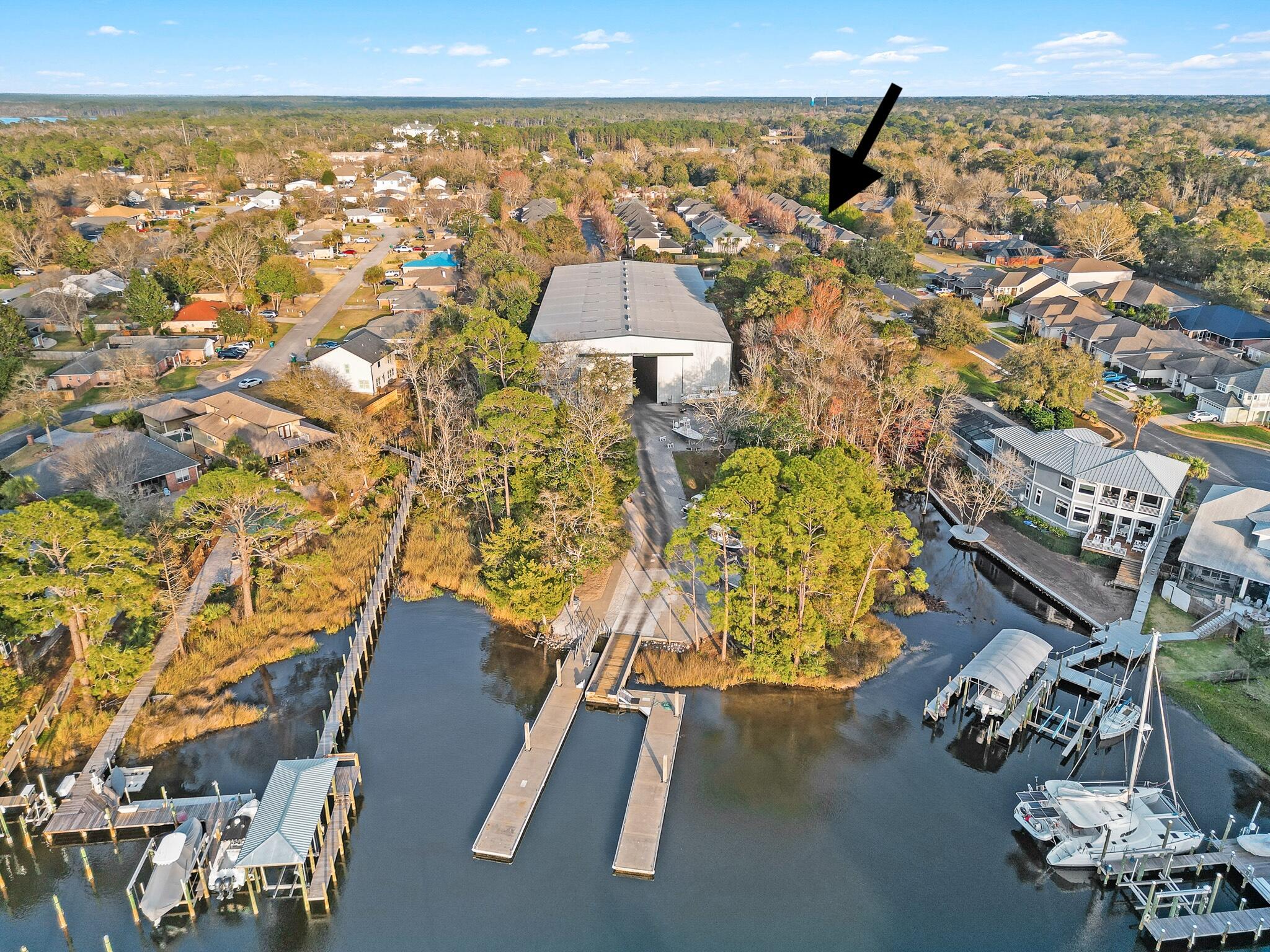 *Seller offering $5,000 in seller's concessions or flex cash! Use it toward closing costs, prepaid expenses, or to help buy down your interest rate and make your monthly payment more affordable.*

Welcome to Marina Landing in the heart of Bluewater Bay, where comfort, convenience, and coastal living come together. This well-maintained 3-bedroom, 2.5-bath townhome offers 1,754 square feet of thoughtfully designed living space with the primary suite conveniently located on the first floor, creating an ideal layout for a variety of lifestyles.
Major updates have already been completed, including a new roof (2023), HVAC system (2024), newer water heater, newer kitchen appliances, and a new garage door opener with warranty, allowing you to move in with confidence. The open-concept living area flows seamlessly into the screened porch, creating the perfect space to enjoy your morning coffee or unwind after a day on the water.
Marina Landing is known for its friendly, welcoming atmosphere and unbeatable location. Just minutes from the marina, community dock, dry boat storage, golf courses, waterfront dining at LJ Schooners, top-rated Bluewater Bay schools, Eglin Air Force Base, and only a short drive to the white-sand beaches of Destin, you'll enjoy the Emerald Coast lifestyle without the beach traffic. Whether you're relocating, searching for a low-maintenance primary residence, or simply looking for one of the best values in Bluewater Bay, this home checks all the boxes.