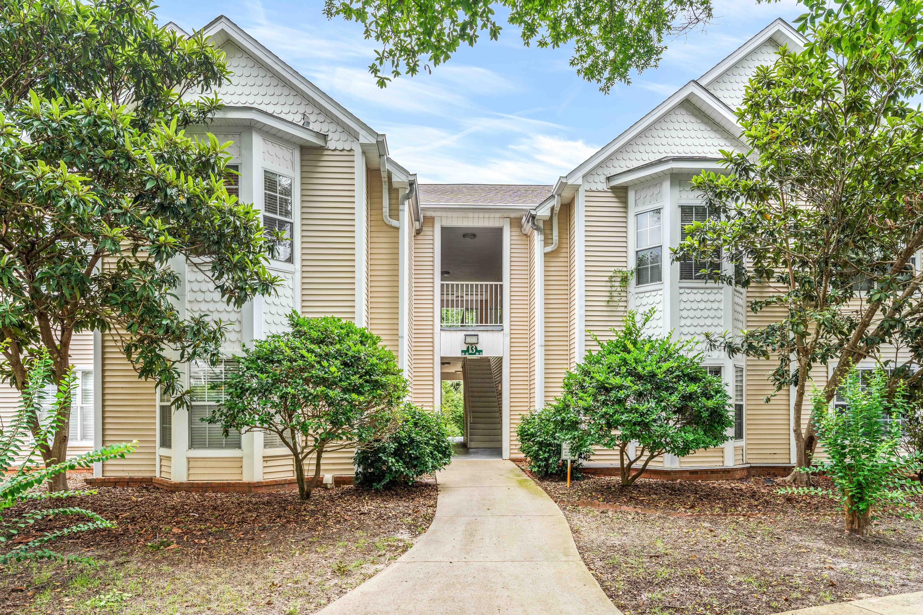 Welcome to easy living in the heart of Niceville. This second-floor 1-bedroom condo at The Oaks offers an enjoyable and practical layout. The Oaks is nestled in a convenient location close to shopping, dining, Northwest Florida State College, Eglin AFB, local parks, and bayfront recreation. This community is very pet friendly.

Inside, the home features a comfortable living area, functional kitchen, and large full bathroom. Major improvements that add even more value and peace of mind include a new roof in 2022, and an AC unit replaced in 2024. These updates may also help with insurance considerations and overall ownership confidence. New flooring installed in 2025 throughout the living/dining area and bedroom offers a fresh, updated feel.

The second-floor location extends privacy, while the community setting keeps everyday needs close by. Whether you are looking to simplify, invest, or secure a well-located Emerald Coast home near the water, this condo is a smart opportunity with meaningful updates to get you started. The Oaks of Niceville is the location you're looking for. This second-floor unit offers easy living in a prime location near shopping, dining, top schools, and Eglin AFB. Tucked along the outer edge of the complex and surrounded by mature trees, it feels more like a private retreat than typical condo living. Quiet, park-like setting with pool and gazebo. VA eligible. No short-term rentals. Rare combination of privacy, convenience, and value, don't miss it!