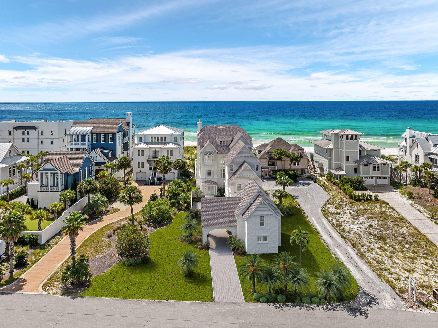 An exceptional opportunity to acquire approximately 0.70 acres with 60 feet of Gulf frontage in the heart of Seagrove Beach. Measuring approximately 60' x 510', 95 San Roy Road offers an increasingly rare combination of Gulf frontage, substantial depth, privacy and redevelopment potential along one of the most desirable stretches of Scenic Highway 30A.

The property is being offered primarily for the value of the Gulf-front land and its future development potential. An existing townhome currently occupies the site; however, it is considered a teardown for purposes of this offering and is not being represented as the primary value of the property. The opportunity is to remove the existing structure and create an extraordinary new Gulf-front estate. Adding significant value to the offering, an exceptional set of architectural plans by Pure Architecture is included with the sale. The plans envision a remarkable four-level Gulf-front residence encompassing approximately 12,935 heated square feet with 8 bedrooms, a bunk room, 10 full baths and 2 half baths. Designed as a true legacy residence, the home combines large-scale entertaining, private guest accommodations, extensive wellness amenities and thoughtfully planned indoor and outdoor living spaces overlooking the Gulf.

The residence is organized around an elevator and dramatic spiral staircase connecting all four levels. The main living floor features an expansive great room with fireplace, dining room and chef's kitchen, complemented by a substantial working pantry, dedicated bar and wine display. Outside, the Gulf-facing pool terrace is designed with a main pool and sun shelf, sunken seating surrounding a fire feature, outdoor shower and direct access to a private dune walkover.

The plans provide exceptional separation and privacy for family and guests. The first level includes multiple guest suites, a bunk room, golf simulator with adjoining lounge, laundry and sand-room spaces, storage and an outdoor shower. A separate guest wing positioned above the two-car garage includes additional bedroom suites, a common living area and morning kitchen, creating an ideal private retreat for extended family or guests.

The third level is centered around an expansive primary suite with a spacious bedroom and sitting area, oversized bath with soaking tub, approximately 20-foot-long walk-in shower, separate closets, private laundry and morning kitchen. A dedicated office with built-ins and an additional guest suite complete the level.

The fourth floor creates a private rooftop wellness and entertaining retreat featuring a gym, sauna with red-light therapy, cold plunge, bar, smart-glass common area and a second pool overlooking the Gulf. The rooftop pool deck extends approximately 43 feet, creating a spectacular setting for entertaining, relaxation and panoramic coastal views.

Vehicle storage and arrival have also been thoughtfully incorporated into the design. The plans include a two-car garage beneath the guest residence, along with approximately 2.5 additional garage bays within the main residence, including dedicated golf-cart space, as well as a covered carport and auto-court.

Located on San Roy Road, a quiet dead-end street south of Scenic Highway 30A, the property occupies a remarkable setting between the Gulf and Eastern Lake. Its position provides expansive Gulf views, private beach frontage and an exceptional degree of privacy while remaining only minutes from Seaside to the west and Alys Beach and Rosemary Beach to the east. Greenway Station, restaurants, shopping and many of 30A's most recognized destinations are also conveniently nearby.

Beyond its appeal as an extraordinary homesite, 95 San Roy Road presents meaningful upside through redevelopment. The combination of substantial Gulf frontage, an oversized homesite and plans for a nearly 13,000-square-foot new-construction residence creates an opportunity to develop a property capable of competing within the uppermost tier of the 30A luxury market. Final value will ultimately depend on construction specifications, costs and market conditions at completion, but the scale and scarcity of the site provide a compelling foundation for long-term value creation.

The seller is a highly respected local builder with extensive experience constructing luxury homes throughout 30A and can also work with a purchaser who wishes to carry the architectural vision from acquisition through construction.

Whether envisioned as a generational family retreat, an extraordinary primary or secondary residence, or a significant luxury redevelopment opportunity, 95 San Roy Road offers something increasingly difficult to replicate: approximately 60 feet of Gulf frontage, roughly 0.70 acres, exceptional site depth and a fully conceived architectural vision for one of the most significant new residences along 30A.