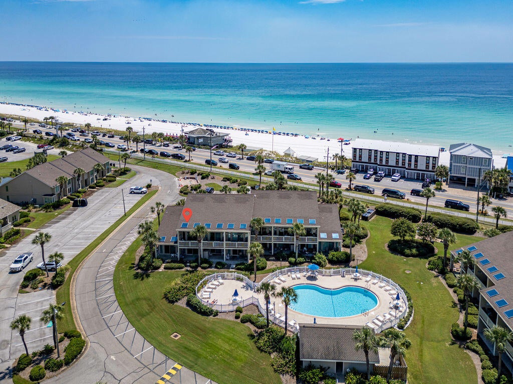 Location...Location...Location...View...View...View...$85,000 in upgrades & a 'Motivated Seller' Too! Directly across from the White Sand Beach & Emerald Green Waters of the Gulf. Click on the photos to discover the 'Best Location' in Seascape with the gulf on one side, a beautiful pool on the other, and easy access to the ever popular 'Whales Tail'! The unit's extensive improvements & furniture upgrades create a very comfortable' Coastal Casual' feel. In addition, the exterior of the building as well has received a new roof, stairwells & handrails with the assessments being paid for already. The condo is not only perfect for permanent living but will also perform very well as a Vacation Rental. If you like the location, upgrades and the view, this is the condo for you!