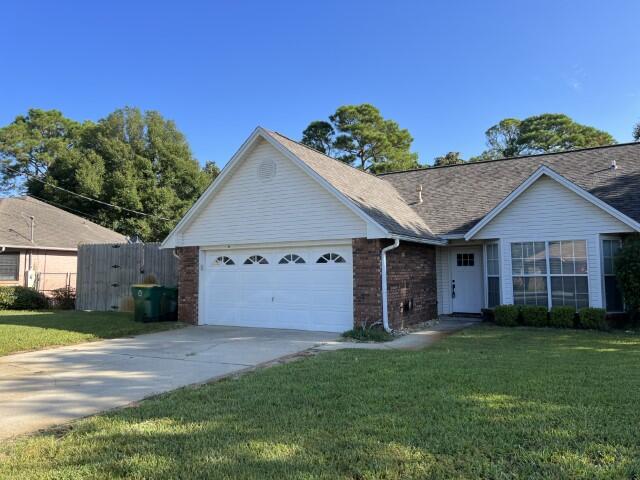 Available now with price improvement!!!!......Just a few minutes commute to Hurlburt AFB.  This home features vaulted ceilings, upstairs loft area, flex space for a home office or 5th bedroom.  Large bedrooms, Florida room and many upgrades.  Renovated kitchen, stainless-steel appliance set and plenty of room.  Large backyard which is perfect for entertaining and grilling on the paver stone back patio.  Privacy fenced back yard, 2 car garage and minutes from the base.  Eat in kitchen as well as a formal dining room space.  Open concept living room with the master bedroom on the 1st floor.  Cozy fireplace with custom accents for Florida winters.  No inside smoking or vaping.  Pets allowed with a $400 non-refundable pet fee and owner approval.  Located near the beautiful Emerald Coast beaches, shopping and much more.