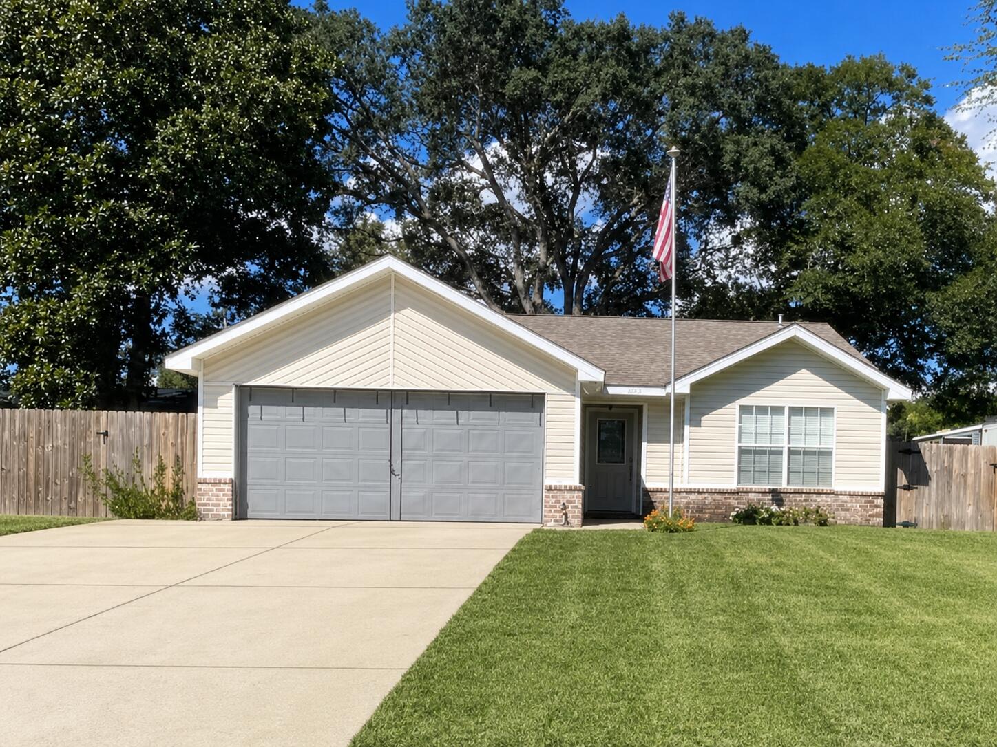 Welcome to this beautifully updated 3-bedroom, 2-bath home in the highly desirable Garnier's Beach community of Fort Walton Beach. Offering the perfect combination of modern updates, functional living, and exceptional outdoor amenities, this move-in-ready home is designed for both everyday comfort and effortless entertaining.

Inside, you'll find a bright, open floor plan filled with natural light and a desirable split-bedroom layout that provides added privacy for the spacious primary suite. The beautifully renovated kitchen serves as the heart of the home, showcasing quartz countertops, white cabinetry, a striking turquoise tile backsplash, soaring ceilings with recessed lighting, stainless steel appliances, and a breakfast bar that flows seamlessly into the living area. French doors open to a heated and cooled Florida room, providing additional year-round living space and a seamless transition to the backyard oasis.
Step outside into your own private resort-style retreat. Enjoy year-round swimming in the beautiful gas-heated inground pool while hosting  unforgettable gatherings in the beautifully landscaped backyard. The pool house provides endless possibilities as a guest retreat, home office, fitness room, game room, or cabana, while the brand-new storage shed offers the perfect space for tools, lawn equipment, and outdoor storage. The oversized driveway, attached two-car garage, and additional parking provide ample room for multiple vehicles, as well as space for your RV, boat, or trailer--a rare feature in this area.

Ideally located just minutes from Eglin Air Force Base, Hurlburt Field, shopping, dining, parks, top-rated schools, and the sugar-white beaches of the Emerald Coast, this exceptional property combines location, lifestyle, and outstanding amenities. If you've been searching for a home with a heated pool, pool house, RV and boat parking, and beautifully updated interiors in Fort Walton Beach, this one truly has it all.