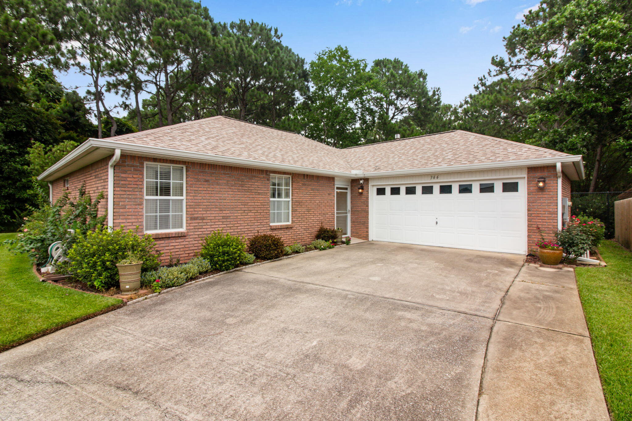 Welcome to this charming 3BD/2BA home located in the highly sought-after Bayside community of Miramar Beach. Just minutes from the sugar-white sands of the Gulf Coast, this well-maintained residence offers comfort, convenience, and plenty of space to enjoy coastal living.

Inside, you'll find a spacious open-concept living area with vaulted ceilings and a cozy gas fireplace, creating a warm and inviting atmosphere. The bright Florida room provides additional living space and is the perfect place to unwind while enjoying peaceful views of the wooded area behind the home. Additional features include a two-car garage, irrigation system, and an oversized driveway with ample parking.

Conveniently located near shopping, dining, entertainment, and the area's beautiful beaches, this home offers the ideal combination of privacy, space, and accessibility in one of Miramar Beach's most desirable neighborhoods.

Tenant pays all utilities. Holding fee is due within 24hrs of approval. Lease must start within 14 days of payment. Lease Prep Fee of $75 is due prior to move in. Approved pets require $400 pet fee per pet. Renters insurance is required. Property is available for a 12-month lease.