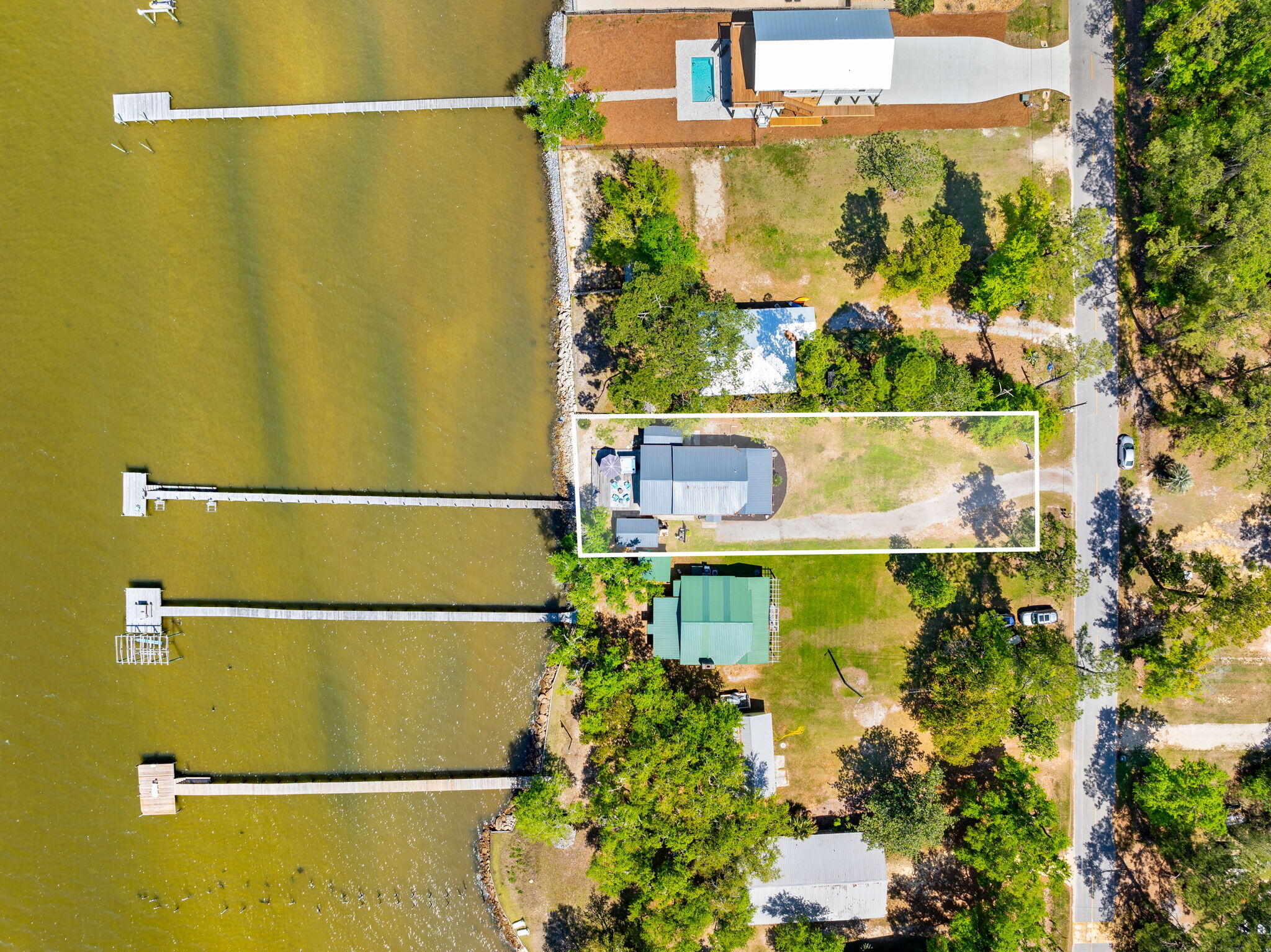 Under Contract with 72 Hour Kickout Clause. 
Discover waterfront living in Freeport, where peaceful bayfront views, a new dock, and no HOA create the ideal coastal retreat. 

Build new or move right into the existing charming 2-bedroom, 2-bathroom home with 60 feet of bay frontage while you design your dream home.

Enjoy direct access to the water and the relaxed lifestyle buyers are searching for along the Emerald Coast. 

A new roof installed in 2024 adds peace of mind, while the prime location places you just minutes from 30A beaches, shopping, dining, and everyday conveniences.