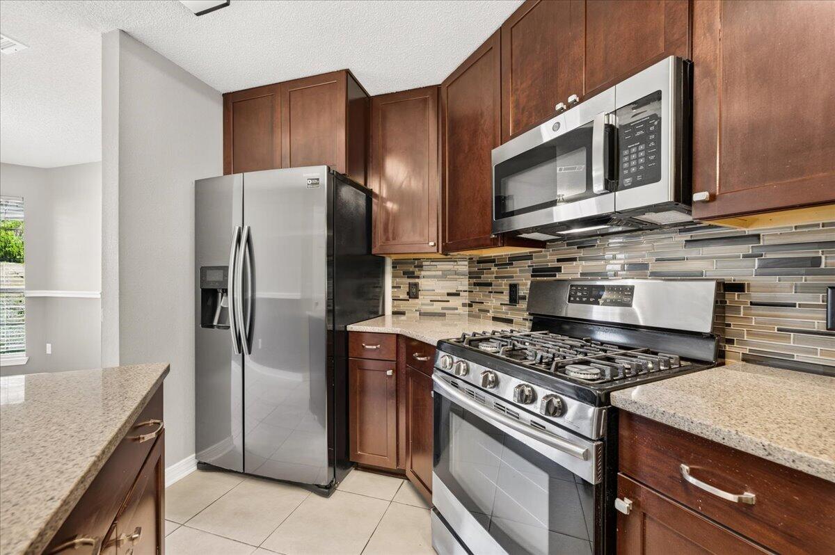ASSUMABLE VA LOAN AT 2.5% INTEREST! In today's rate environment, this is one of the standout features of 5197 Whitehurst Lane, a beautifully updated 4-bedroom, 2-bathroom home in Crestview's Antioch Estates. A qualified VA buyer may be able to assume this rate, subject to lender and VA approval and buyer qualification. Beyond the incredible rate, this one-story home offers approximately 1930 square feet on a spacious 0.28-acre lot with NO HOA, giving owners real flexibility. The interior has been freshly painted throughout and features NO CARPET, with easy to maintain LVP and tile flooring in every room. Vaulted ceilings and crown molding add character to the approximately 21 by 20-foot living room. The updated kitchen boasts granite countertops, a center island, pantry, gas stove, and stainless-steel appliances. The split floor plan primary suite includes a walk-in closet and a remodeled bathroom with dual granite vanities and shiplap accents. Outside, buyers will find a privacy fenced backyard, a newer deck with canopy, two storage sheds, an enclosed pet area, and an extended driveway with backyard access, perfect for RV or boat parking. The home also benefits from a 2020 roof and fully replaced septic lines. Located just a couple of streets from A rated Antioch Elementary School and close to Blackwater Golf Club. Vacant and ready for immediate occupancy. Ask your agent about the assumable loan details today. The secondary bathroom has also been tastefully remodeled with granite countertops and matching shiplap accents, creating a cohesive updated look throughout the home. The attached two car garage measures approximately 21 by 19 feet and features an upgraded granule coated floor for a clean, durable finish, offering plenty of room for vehicles, tools, and storage.

The drainage system has been thoughtfully improved as well. All gutters are connected to a dedicated French drain, and the underground drainage lines have been upgraded to PVC and extended beyond the rear fence line, helping direct rainwater away from the home and backyard.

Utilities include public water, septic service, natural gas, central electric HVAC, electric heat, ceiling fans, and washer and dryer hookups. Crestview continues to grow, and anticipated future I-10 access improvements in the area may offer added convenience for commuters throughout Okaloosa County and Northwest Florida.



With a rare assumable VA loan at 2.500 percent, a spacious layout with no carpet, an updated kitchen and bathrooms, a privacy fenced yard with two sheds and an enclosed pet area, and an extended driveway built for RV or boat storage, 5197 Whitehurst Lane offers a combination of updates, space, and flexibility that is hard to find in today's market. Schedule your showing today.