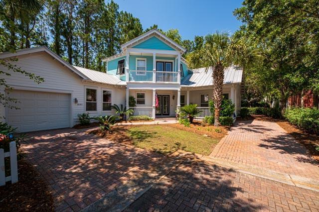 Spacious, custom-built home located on a private cul-de-sac within the golf cart-friendly neighborhood of Olde Towne area in Sandestin. Providing year-round amenities, including private beachfront resort with additional beachfront community pool, bar, and restaurant.  Enjoy golf course living with clubhouse events, fitness, tennis, hiking, and upscale dining and shopping.  Short-term rental restricted, it's perfect for year-round residence or a second home. Shuttle or drive your golf cart to all Sandestin's amenities, including the beach.  This beautiful property offers privacy, wildlife, and serenity from an abundance of outdoor verandas. Inside, you will fall in love with this Feng Shui-inspired home waiting for your personal touches.  From the double-door entry, you are greeted by upscale finishes and exotic Tiger Travertine floors that flow continuously through the custom kitchen, entry, and family areas. The master suite and guest bedroom are on the main level. One car garage with two separate driveways.  Balconies with serene views. Enjoy lower NW Florida Property Millage Tax Rates.  For more information about Sandestin Golf and Beach Resort and the area, please visit their websites at Sandestin.com, BaytowneWharf.com, and WaltonAreaChamber.com, to name a few.