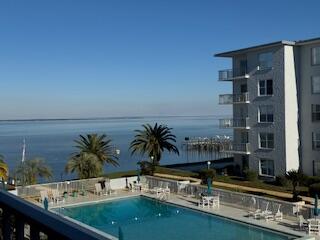 Reduced $20,000 AND is currently the ONLY unit in this complex with a boat slip!!  Enjoy breathtaking bay front living in this 2 bedroom, 2 bath condo that transfers with a BOAT SLIP and lift. Fully furnished and ready to enjoy, this unit features stainless steel appliances, granite countertops, crown molding, porcelain tile, and new, extra plush carpet in the bedrooms and living area. Located just minutes by boat from Crab Island and Destin's world-famous beaches, Century Park West offers unbeatable convenience and a quiet coastal lifestyle at an affordable price. Community amenities include a large waterfront pool, community room, grilling areas, boat dock with slips, assigned parking, on-site HOA management, and a laundry room on every floor.
