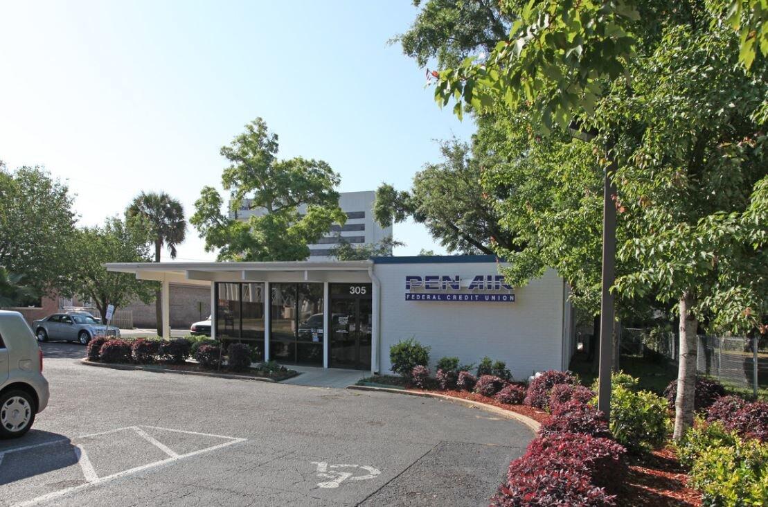 Formerly the Pen Air Credit Union adjacent to the Downtown Pensacola library, has been remodeled and re-purposed as a downtown office building with the perfect location! Currently set up with a front reception area, a cubicle pit area for 4 workstations, 7 offices, 1 large conference room, a break room with kitchenette, 2 large & secure filing/storage areas (One of which was formerly the bank's vault), 3 restrooms and signage. The building is situated on a large corner parcel, over a 1/2 acre
with road frontage and access via both Gregory St & Barcelona St. Parking for 20+ cars. Location doesn't get any better than this! Just one block off Garden street puts you directly adjacent to the library as well as super close walking distance to fantastic restaurants and downtown amenities. Owner/Landlord holds a Florida Real Estate Broker's license. Please schedule appointment with the owner if you would like to view the property. Current tenants lease ends 09/30/2026.
