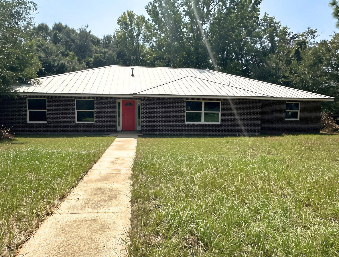 This property presents a rare and high-potential canvas for real estate investors, ambitious renovators, or buyers looking to craft custom equity. 

This residence was rebuilt in 2017 and has been vacant since, never having been lived in. All utilities have been off since approximately 2021. Home to be sold AS-IS. Price has been set accounting for suspected needed repairs. 

Situated on a spacious corner lot, the residence offers generous yard space in one of the Emerald Coast's most peaceful and beloved neighborhoods--renowned for its oak-lined streets, friendly community atmosphere, and easy access to local bayous, boat launches, Eglin Air Force Base, and the sugary white beaches of the Gulf Coast.