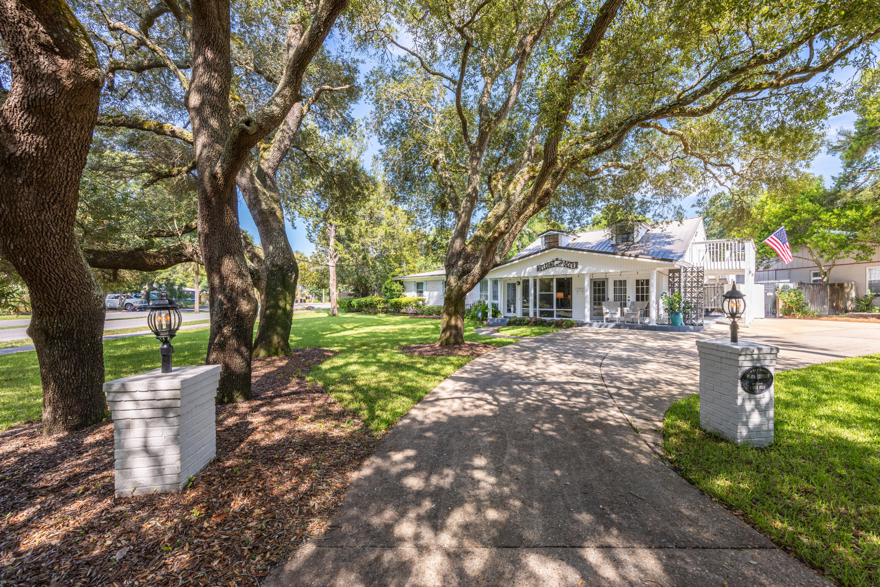 Experience the best of coastal living in this charming 5-bedroom home situated in the quiet, well-established neighborhood of Elliott Point.  With just a short drive to the beach or boat launch, this beautiful home blends the best of an Old Florida lifestyle with modern conveniences, and extensive outdoor living.   The main floor offers 4 bedrooms, 2 baths, kitchen, pantry, laundry, and two spacious living areas along with a large, screened patio just off the back dining room.  While the second floor brings a bonus space, currently used as a bedroom, with a half bath, and an over-sized balcony with peek-a-boo views of Choctawhatchee Bay.  The large backyard and garden areas include a brick grill-fireplace, a hot tub and gazebo, an outdoor shower, a peaceful lanai and fountain area, and a side driveway with two outdoor storage sheds.  The additional side driveway also offers space for an RV or boat. Wake up early and watch the sun rise over the Bay at the Hollywood Blvd Water Access Park only steps from your front door.  In addition, this home is equipped with a whole-house water filtration system, a 50-gallon water tank, and an updated irrigation system with both front and backyard sprinklers. The seller is offering a home warranty and has a transferrable termite bond.  This home benefits from having no HOA, yet is close to the beach, restaurants, great schools, and all the abundance of water activities the Emerald Coast is known for.  Schedule your private showing today!