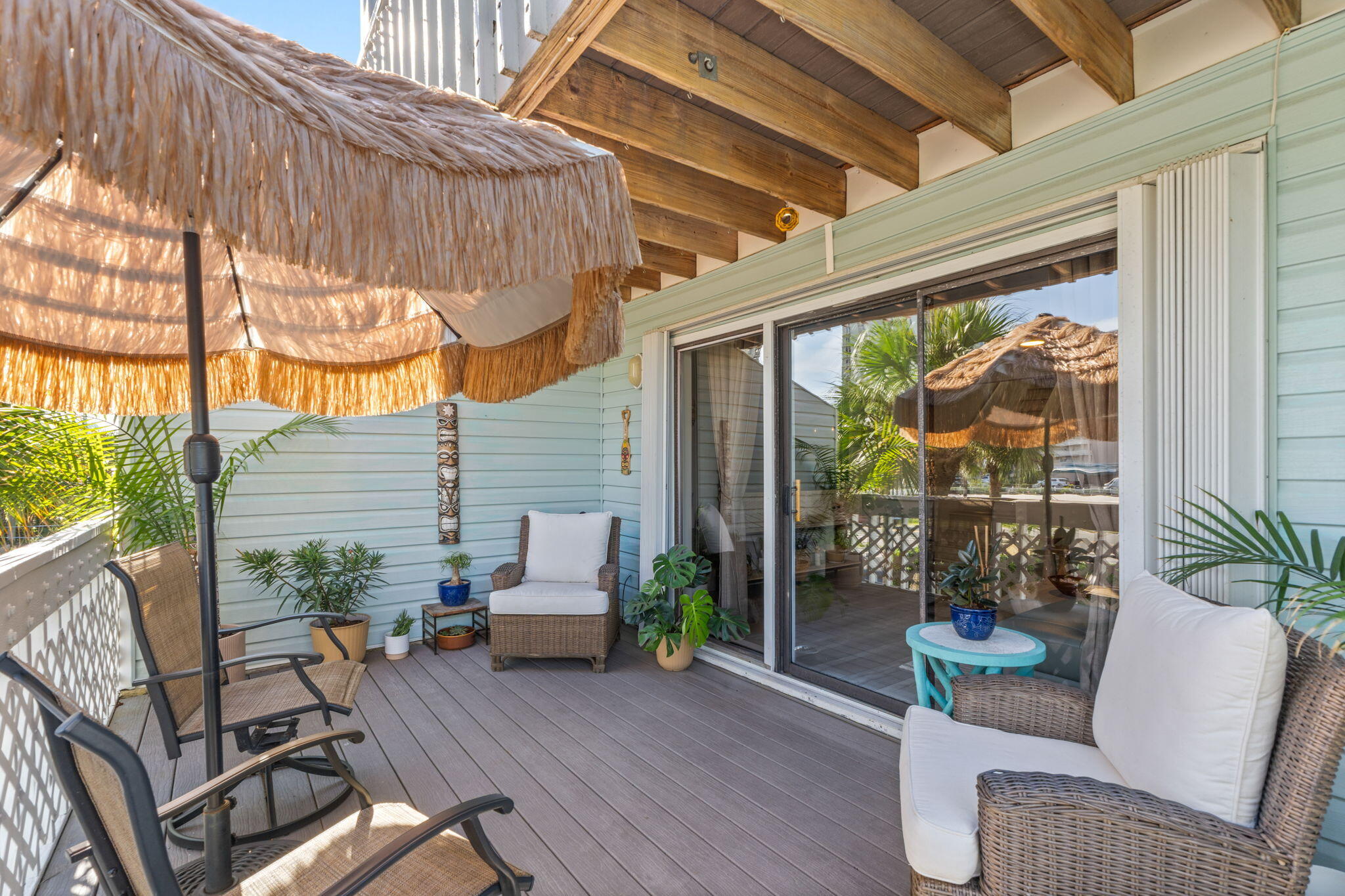 Are you ready to Vacation every single day? Gorgeous updated townhome in the much sought after Sandcastle on Navarre Beach! Amazing location! Easy Walking distance to the beach, pier, 4 different restaurants/bars and the Navarre Beach Sea Turtle Center. Large balcony off the living room is the perfect place to relax and enjoy the gentle sea breeze. Oversized living room and entertaining area. Stunning furniture throughout conveys so you can just bring your clothes and move right in. Updated kitchen and breakfast area. Full bath on this floor. Upstairs you'll find the primary suite and the 2nd bedroom. Just wait until you see the bathroom! There are peekaboo views from the primary bedroom and living room balconies, plus prime viewing for any parades! Parking for 2 cars plus extra area for a golf cart or outdoor living area. Community Dock with boat slips, pool, 2 gigabit Live Oak internet and direct TV. Whole house water filtration system, new Kitchen Aid appliances, 2024 metal roof, 2022 HVAC. There is nothing left to do but enjoy yourself! Don't miss this townhouse as its a really good one and its squeaky clean!!