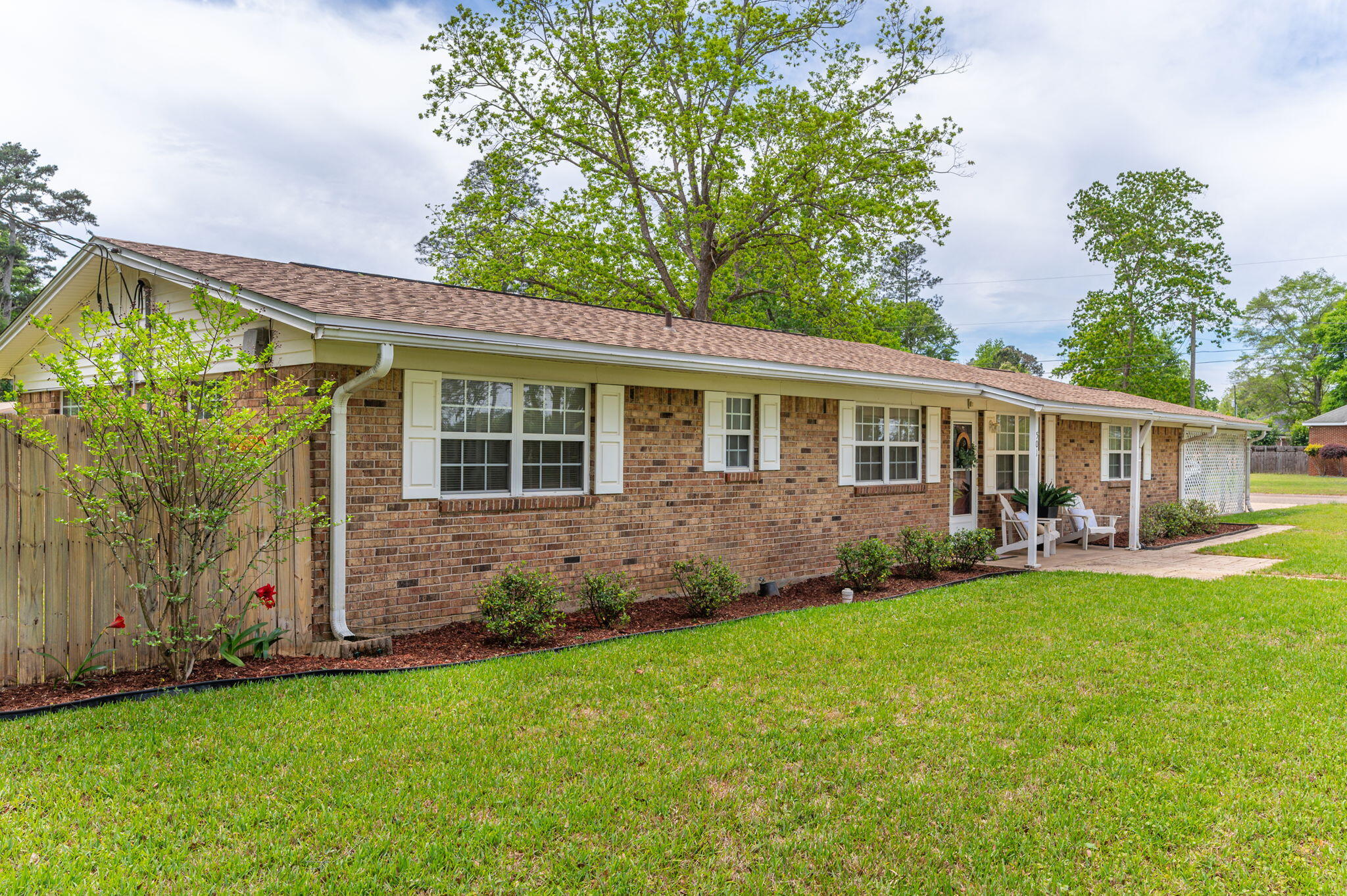 Welcome to a home where timeless character meets thoughtful updates! Lovingly cared for by the same family ever since it's construction, this all-brick beauty is full of charm and pride of ownership you can truly feel the moment you arrive. Major updates provide peace of mind, including a newly installed roof and water heater, a 2018 HVAC system, and updated electrical that has been fully rewired from aluminum to copper, along with a new breaker box and subpanel. Situated on a spacious corner lot with lush St. Augustine grass, the property offers a fully privacy-fenced backyard plus plenty of room for RV parking, boats, trailers, and all your outdoor toys--perfect for those who need both space and flexibility. Inside, you'll find crown molding throughout and a warm, inviting layout that stands apart from today's cookie-cutter homes. The kitchen is rich with character and functionality, featuring abundant cabinet and countertop space, under-cabinet lighting, and a beautifully lit glass display cabinet for showcasing your favorite pieces. The oversized 23x18 family room is truly the heart of the home, complete with custom built-in bookcases that add both charm and practicality--also echoed in the dining room. Just off the family room, you'll find a 20x11 Florida room (cooled by a window unit and not included in the square footage), offering the perfect bonus space for relaxing, entertaining, or enjoying your morning coffee.
The hall bathroom features a walk-in tub, offering ease of access and comfort--an added bonus that can be appreciated by a variety of lifestyles. Conveniently located near local schools, shopping, and everyday amenities, this home combines location, space, and character in one exceptional package. If you've been searching for a well-built home with personality, room to grow, and thoughtful updates, this is one you don't want to miss!
