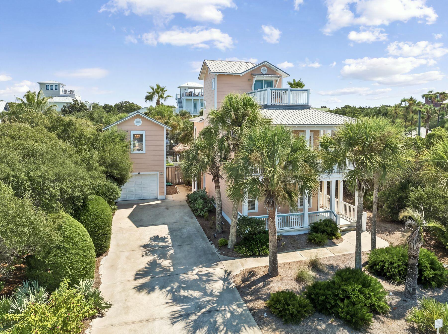 Just five lots from the Gulf and tucked south of 30A in Blue Mountain Beach, 111 Sand Dunes Road offers a combination that is increasingly difficult to find along Scenic Highway 30A: exceptional proximity to the beach, Gulf views, a generous .26-acre homesite, a private pool and a separate carriage house.
Designed to embrace its coastal setting, the home features expansive porches and outdoor access from every bedroom, creating a seamless connection to the Gulf breezes and relaxed rhythm of beach life. Gulf views add to the experience, while the third-floor gathering space provides an elevated retreat for taking in sunsets and offers flexibility for additional sleeping or guest space.
Outside, the generous .26-acre homesite allows for something rare to find this close to the beach - a spacious backyard centered around a 20' x 13' private heated pool, with plenty of room for lounging, entertaining and gathering after a day on the Gulf. Multiple porches extend the living spaces outdoors, offering additional places to enjoy Gulf breezes and the surrounding coastal setting.
Adding even more versatility is the separate carriage house above the one-car garage, complete with a bedroom, full bath and kitchen - ideal for guests, extended family or additional rental accommodations. Located in the heart of Blue Mountain Beach with multiple beach accesses nearby, the property places the Gulf just steps away while offering the space, privacy and outdoor living that can be difficult to find this close to the shoreline. Whether enjoyed as a full-time residence, second home or investment property, 111 Sand Dunes Road brings together many of the features most sought after in a 30A beach home: a coveted south-of-30A location, Gulf views, a large homesite, substantial private pool, carriage house and exceptional proximity to the beach.