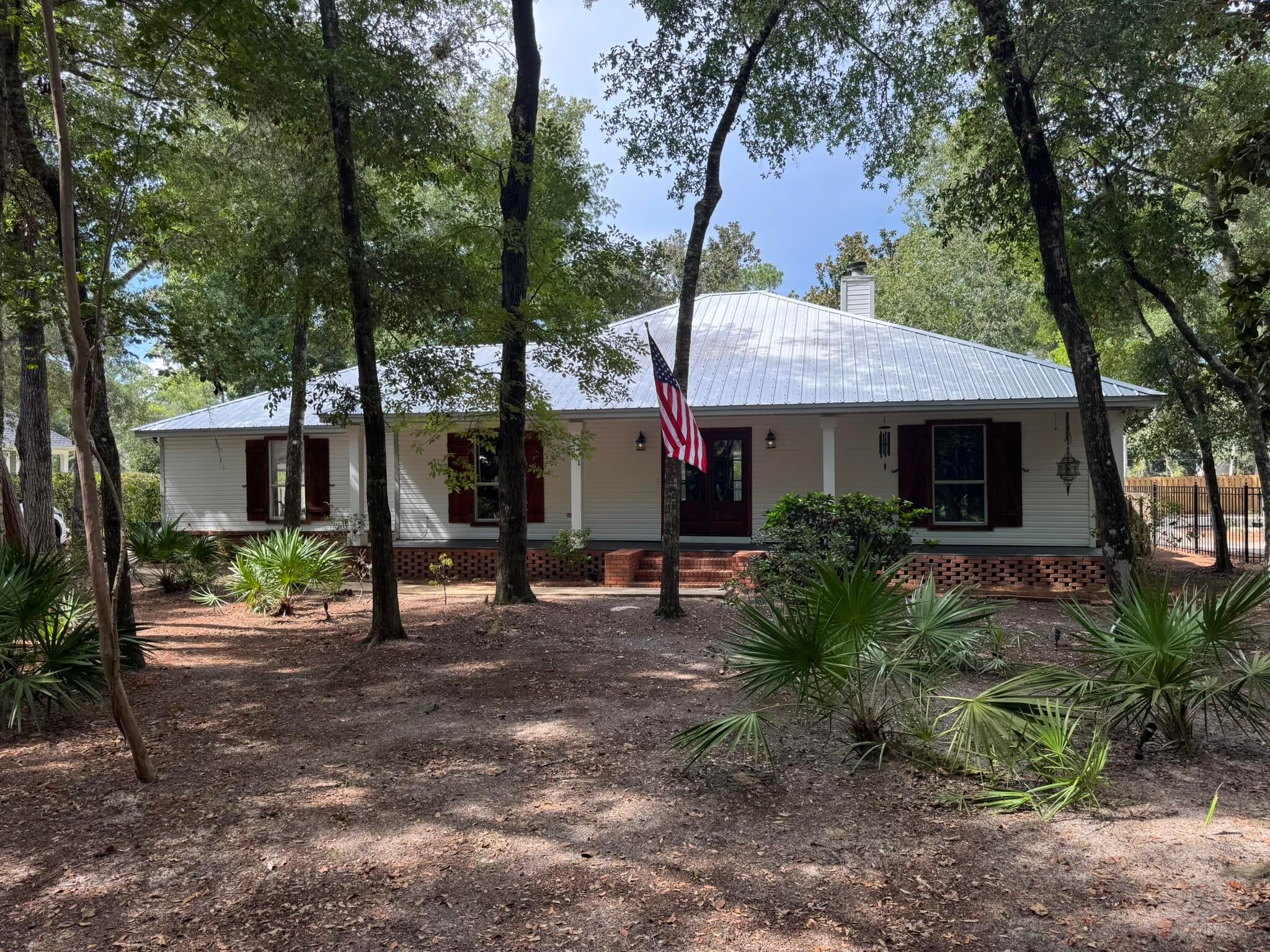 Looking for a spacious, comfortable home in a fantastic Santa Rosa Beach location? This 3-bedroom, 2-bathroom, 1,800-square-foot home in the Mack Bayou area offers the perfect combination of space, privacy, convenience, and coastal living.
Located on a quiet cul de sac surrounded by mature trees, the home has a peaceful neighborhood feel while being just minutes from the beaches, 30A, shopping, restaurants, schools, and outdoor recreation. The home features LVP flooring throughout the living areas and bedrooms, along with stone flooring in the kitchen and bathrooms. The kitchen features butcher block countertops and stainless steel appliances, including a dishwasher, microwave, oven/range, and refrigerator. A separate small office or gaming room provides a dedicated space for working from home, gaming, studying, or hobbies. The home features a large fenced-in backyard, making it an excellent choice for families and pet owners. Relax on the large front porch or enjoy the privacy of the screened-in back porch, perfect for morning coffee, outdoor dining, or relaxing after a day at the beach. The very large garage and driveway provide parking cars, bikes, kayaks, paddleboards, and all the gear that comes with enjoying the Emerald Coast. One of the property's standout features is access to a neighborhood dock on Choctawhatchee Bay. Enjoy fishing, kayaking, paddleboarding, boating, or simply relaxing by the water. If interested, call Jody (owner) at 850-376-0964.