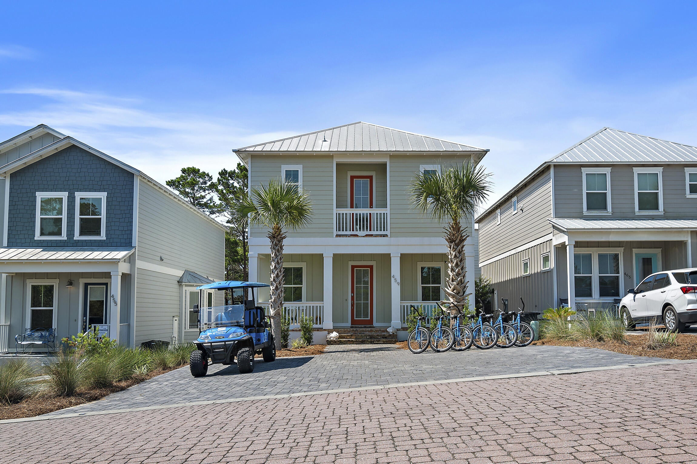 Serenity at Dune Allen is an 87-home vacation-rental community on the quieter west end of 30A, and this 2020-built four-bedroom sits on one of its interior homesites, a few steps from the community pool and just over a quarter mile from the public beach access at Dune Allen. It delivers the floor plan that drives bookings: four bedrooms, each with its own ensuite bath and walk-in closet, plus a main-level primary suite, so two or three families can book together without anyone sharing a bath or climbing stairs. Ten-foot ceilings and 8-foot doors on both levels give the home the volume guests expect from newer 30A construction, and the island kitchen opens directly to the dining area for easy group meals. The deep covered porch trimmed in Old Chicago brick earns the first click in a listing photo. Brick-lined streets, a gazebo overlooking the nature preserve, and a short walk or golf cart ride to Stinky's Fish Camp or one of the best public beach access on 30A. Newer construction, a turnkey layout, and a rental-friendly community make this a sound addition to any 30A portfolio.